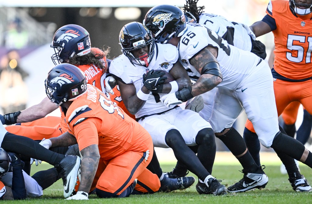 Should Broncos sign RB Travis Etienne Jr. or rely on NFL draft?