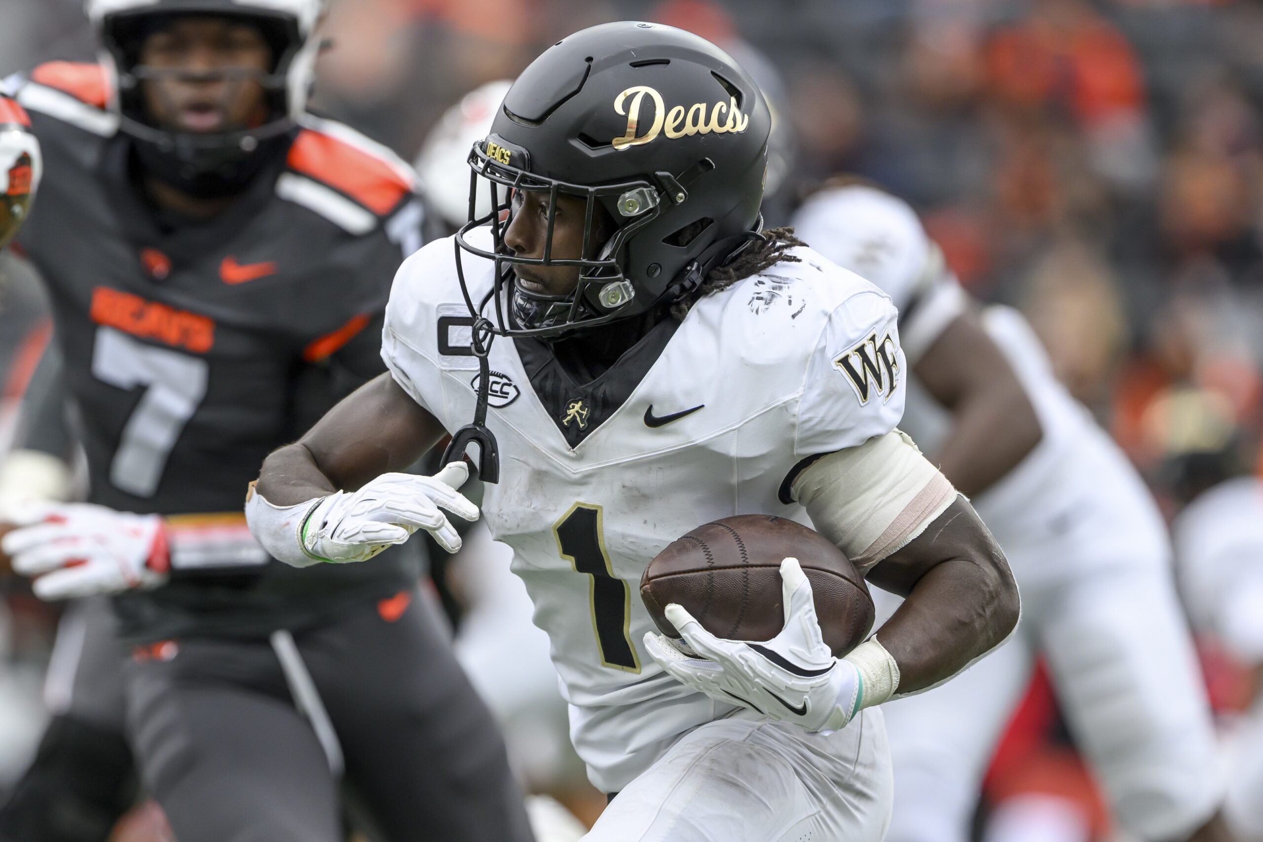 Oct 11, 2025; Corvallis, Oregon, USA; Wake Forest Demon Deacons running back Demond Claiborne (1) runs the ball during the second half against the Oregon State Beavers at Reser Stadium. Mandatory Credit: Craig Strobeck-Imagn Images