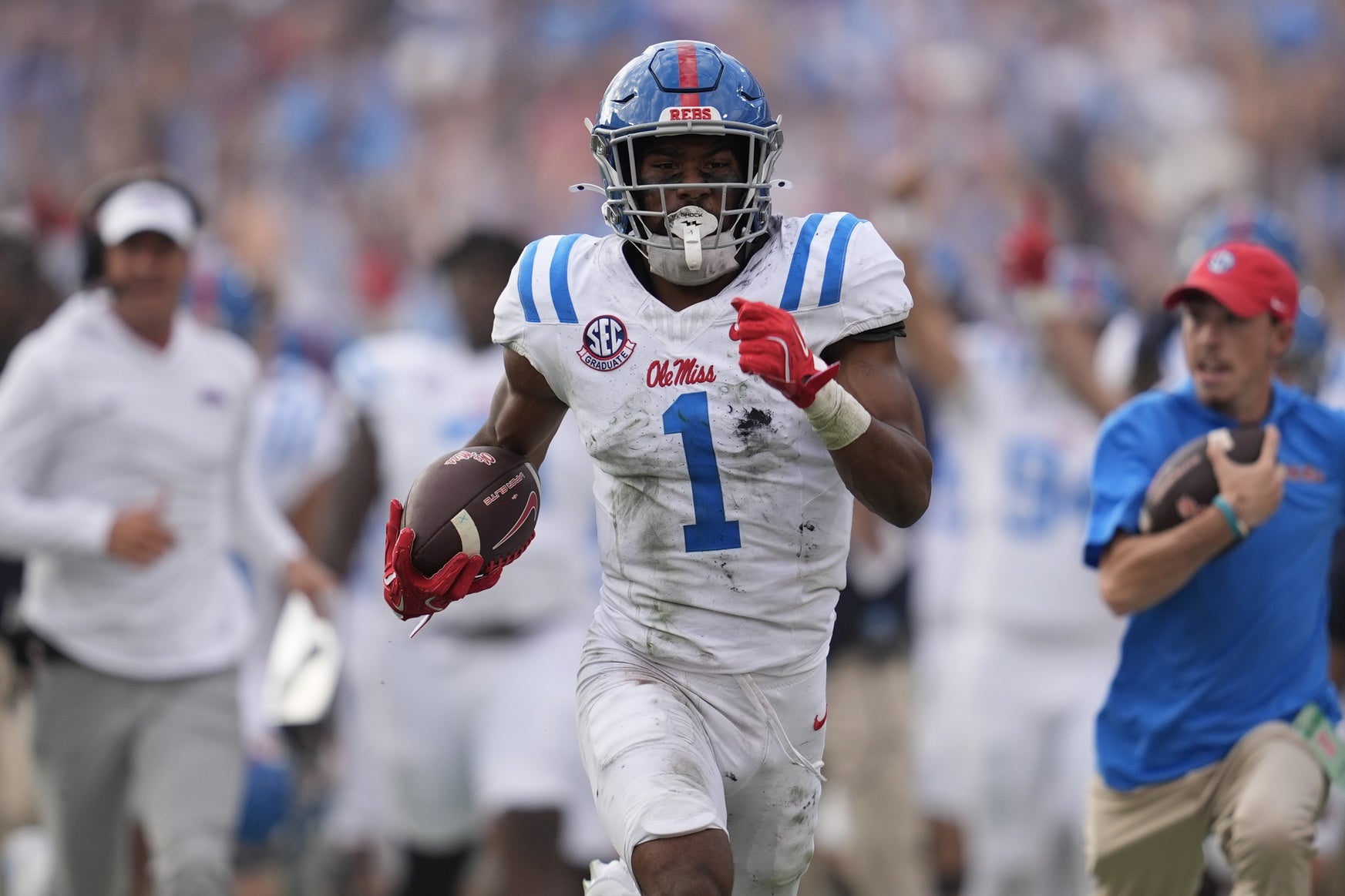Oct 18, 2025; Athens, Georgia, USA; Mississippi Rebels wide receiver De'Zhaun Stribling (1) runs for a touchdown against the Georgia Bulldogs during the second half of the game at Sanford Stadium. Mandatory Credit: Dale Zanine-Imagn Images