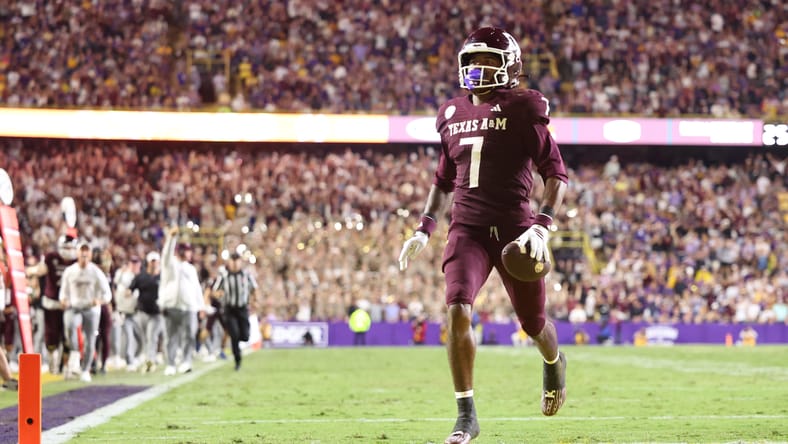 KC Concepcion returns a punt for a touchdown against LSU at Tiger Stadium. Vikings mock draft 2026