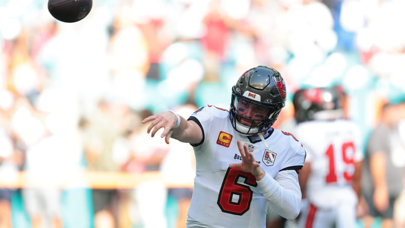 Baker Mayfield warms up on the field before a Buccaneers game at Hard Rock Stadium