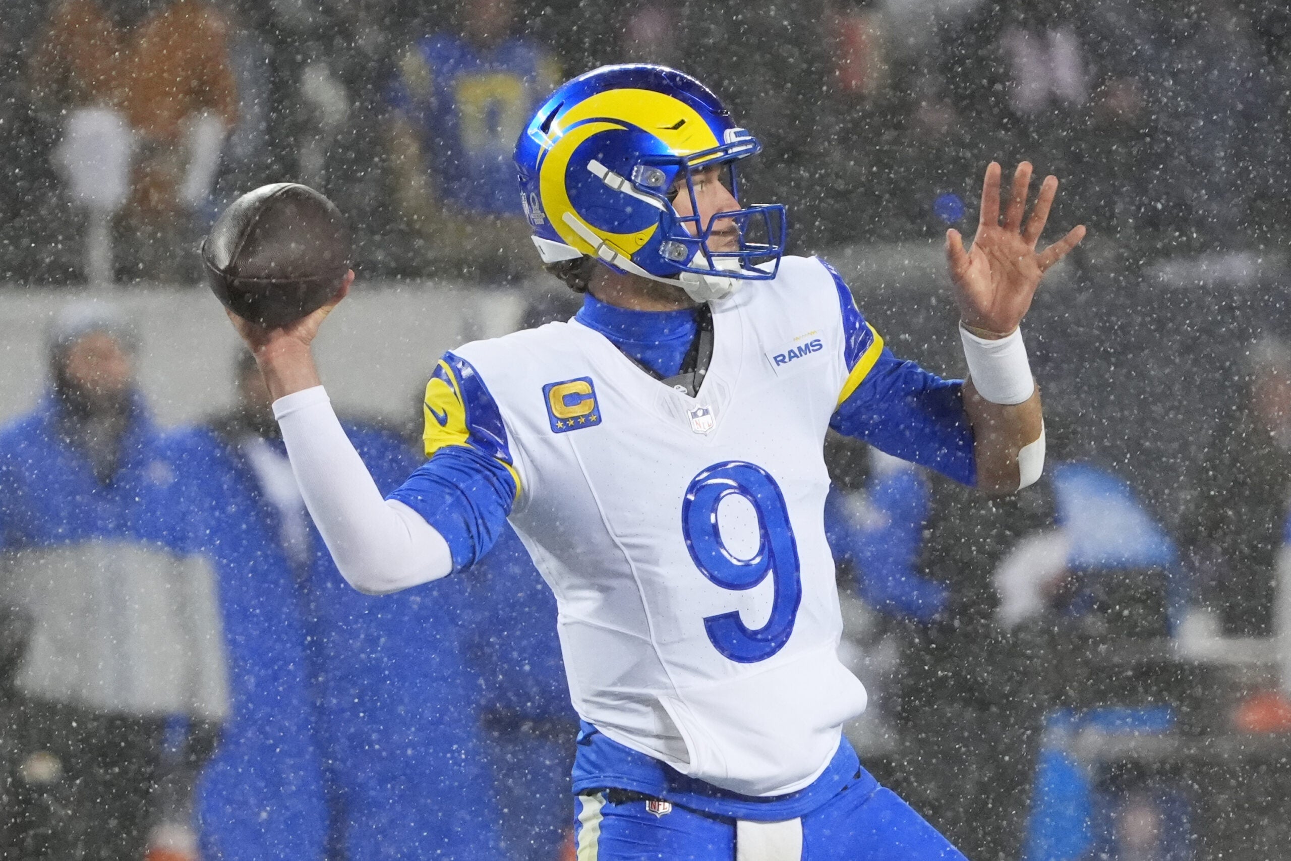 Jan 18, 2026; Chicago, IL, USA; Los Angeles Rams quarterback Matthew Stafford (9) throws a pass against the Chicago Bears during the second quarter of an NFC Divisional Round game at Soldier Field.