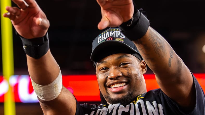 Mikail Kamara celebrates after Indiana wins the national championship game. Vikings mock draft 2026