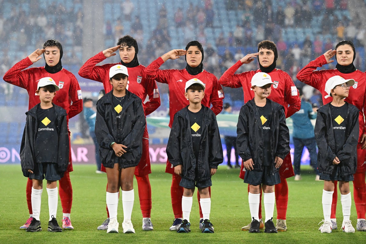 Australia urged to grant asylum to Iranian women’s football team after anthem controversy