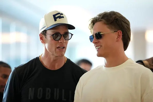 Quarterback Tom Brady of the Founders FFC and quarterback Joe Burrow of the Wildcats FFC