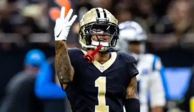 Alontae Taylor signaling after a defensive play while wearing his New Orleans Saints jersey during an NFL matchup.