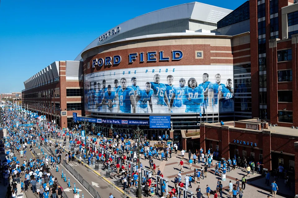 Detroit Lions fans tailgate outside of the Ford Field in downtown Detroit, Sunday, October 8, 2017.