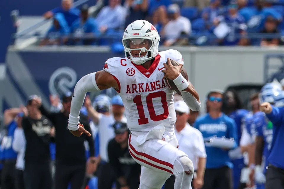 Sep 20, 2025; Memphis, Tennessee, USA; Arkansas Razorbacks quarterback Taylen Green (10) runs with the ball against the Memphis Tigers during the second half at Simmons Bank Liberty Stadium.