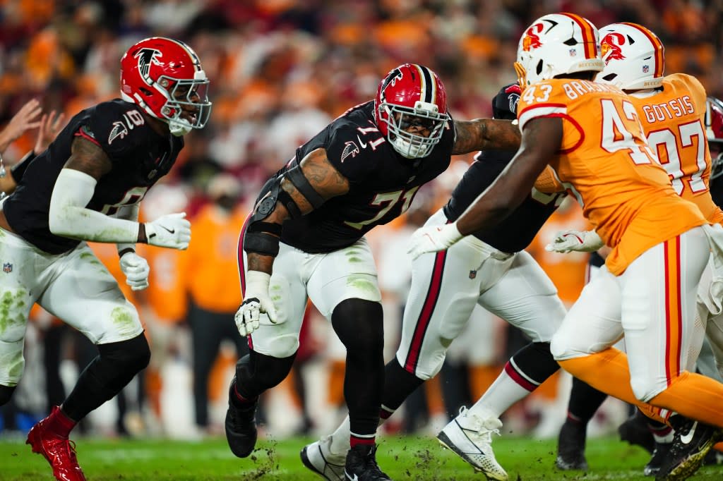Elijah Wilkinson #71 of the Atlanta Falcons drops back to block during an NFL football game against the Tampa Bay Buccaneers at Raymond James Stadium on December 11, 2025 in Tampa, Florida. Getty Images