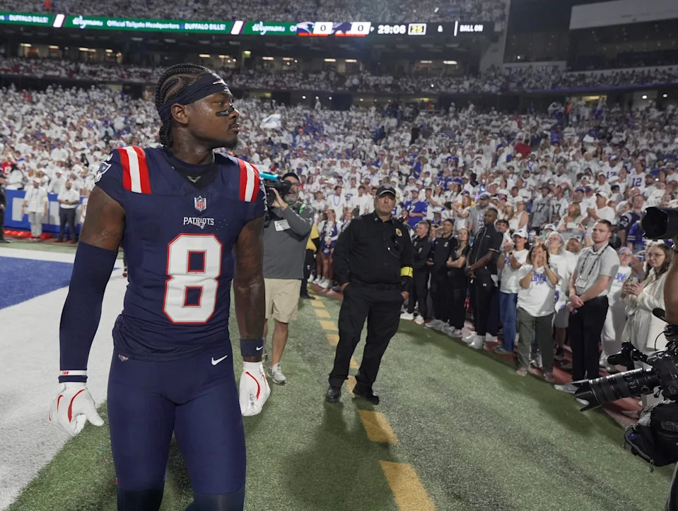 Stefon Diggs, a former Bills player, looks around at the crowd as the crowd has a mixed reaction to his return with another team before the Bills home game against the New England Patriots at Highmark Stadium in Orchard Park on Oct. 5, 2025.