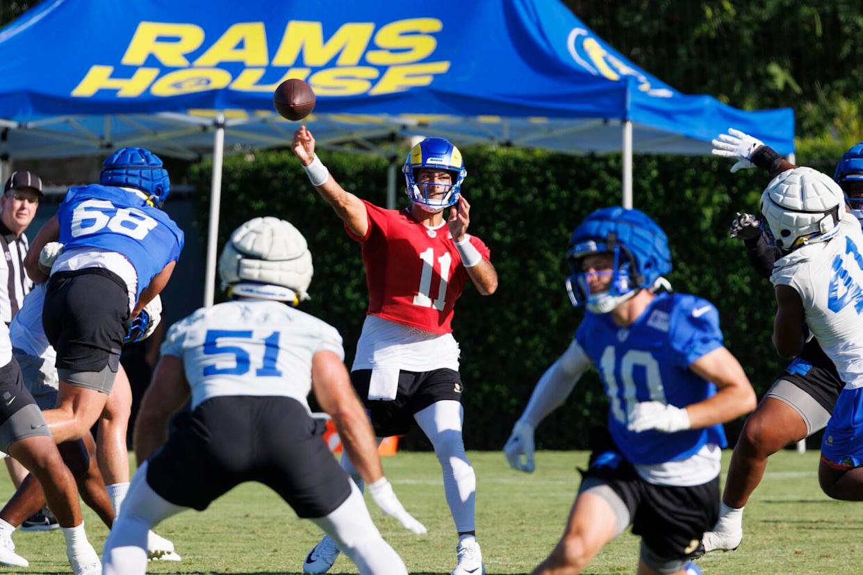 Rams quarterback Jimmy Garoppolo passes during training camp in July.