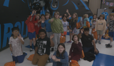 Carolina Panthers visit Wilmington schools to give every student a new pair of shoes