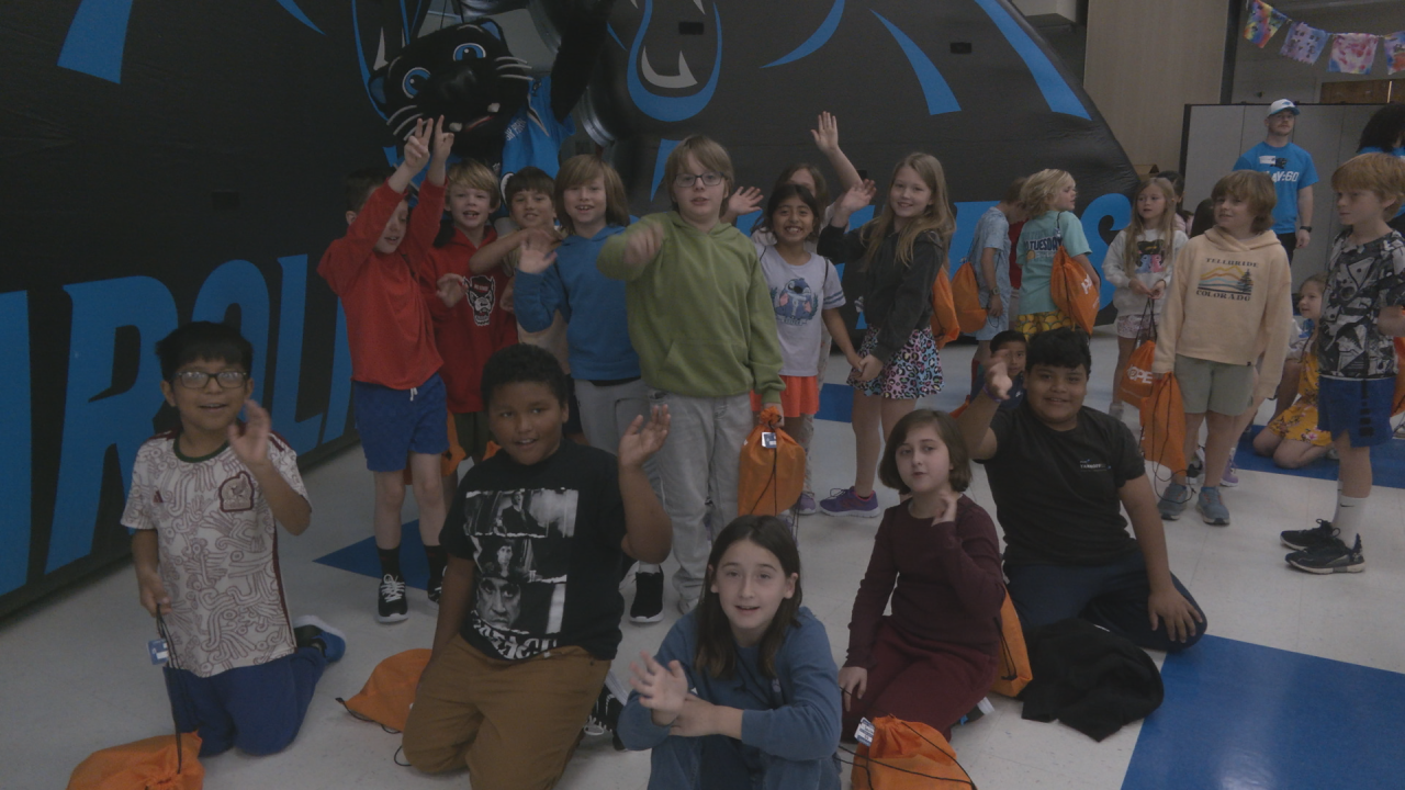 Carolina Panthers visit Wilmington schools to give every student a new pair of shoes