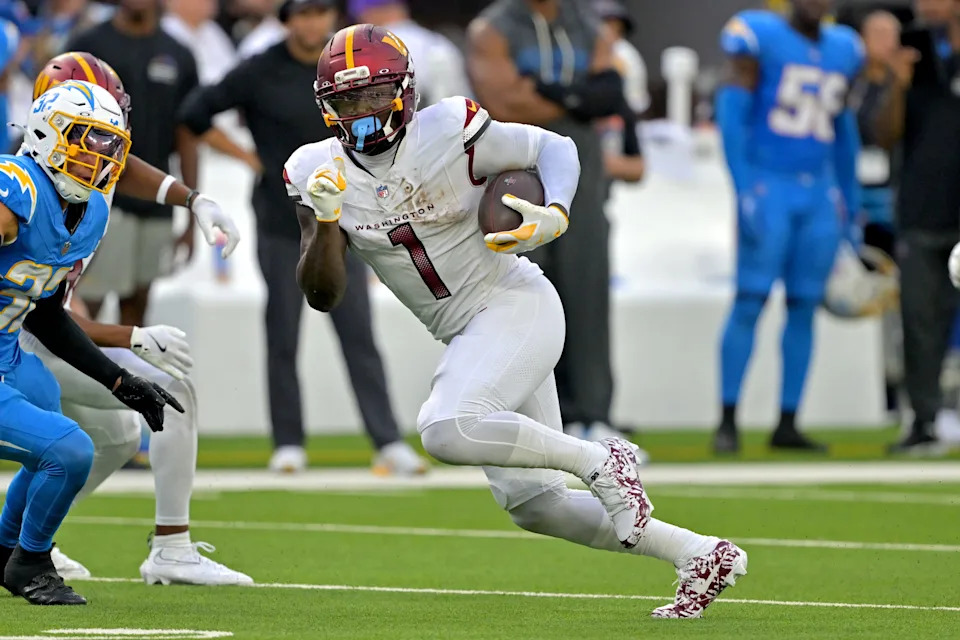 Oct 5, 2025; Inglewood, California, USA; Washington Commanders wide receiver Deebo Samuel Sr. (1) runs against the Los Angeles Chargers at SoFi Stadium. Mandatory Credit: Jayne Kamin-Oncea-Imagn Images
