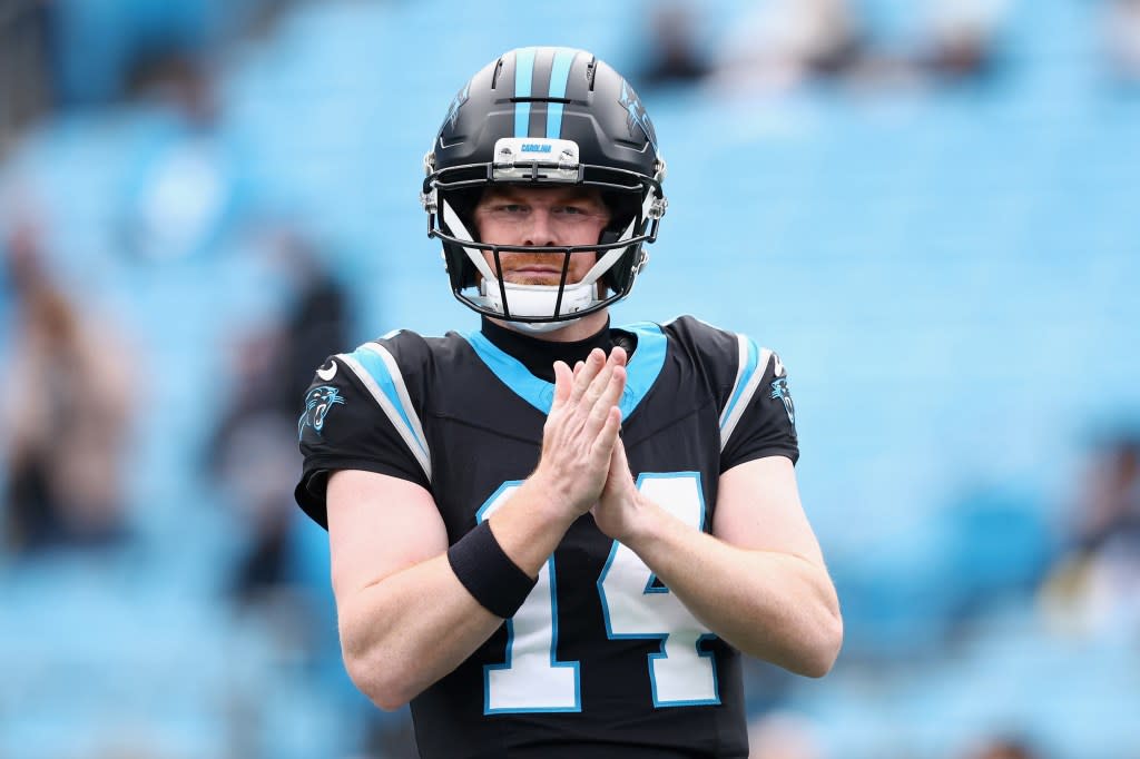 Andy Dalton #14 of the Carolina Panthers warms up before a game against the Tampa Bay Buccaneers at Bank of America Stadium on December 21, 2025 in Charlotte, North Carolina. Getty Images