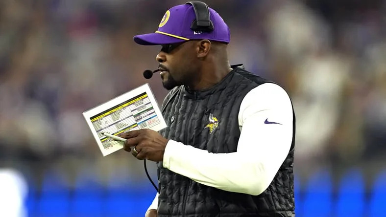 Brian Flores watches from the sideline during a Vikings game against the Rams. Vikings offseason decisions 2026