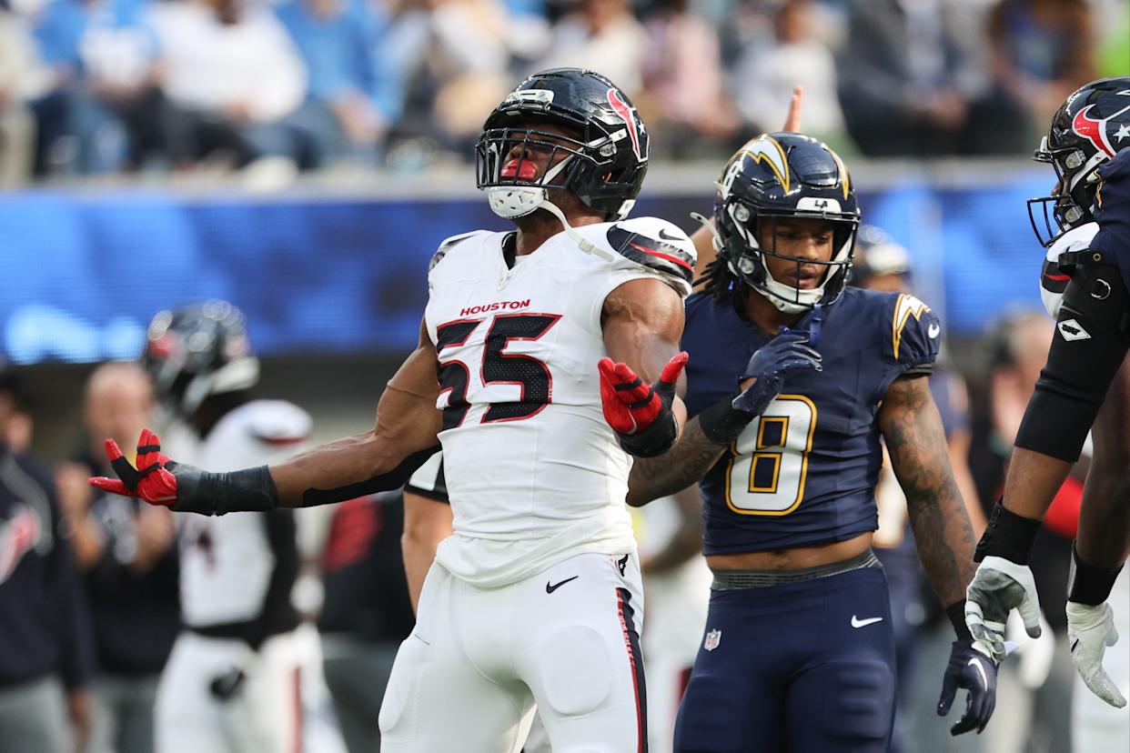 Houston Texans defensive end Danielle Hunter (55) celebrates after sacking Los Angeles Chargers quarterback Justin Herbert during the first half of an NFL football game Saturday, Dec. 27, 2025, in Inglewood, Calif.
