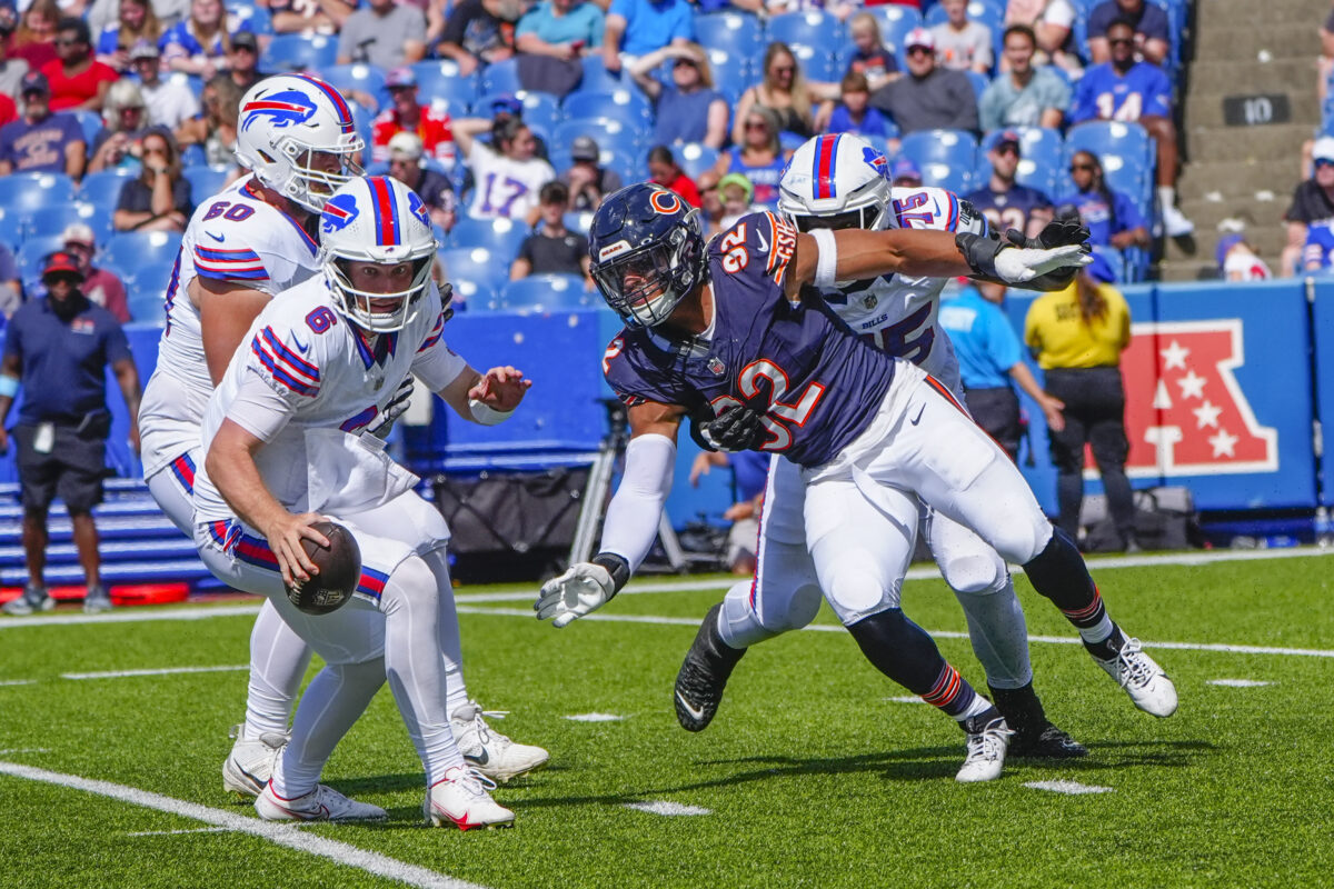 Aug 10, 2024; Orchard Park, New York, USA; Chicago Bears defensive end Daniel Hardy (92) pursues Buffalo Bills quarterback Shane Buechele (6) during the second half at Highmark Stadium. Mandatory Credit: Gregory Fisher-USA TODAY Sports