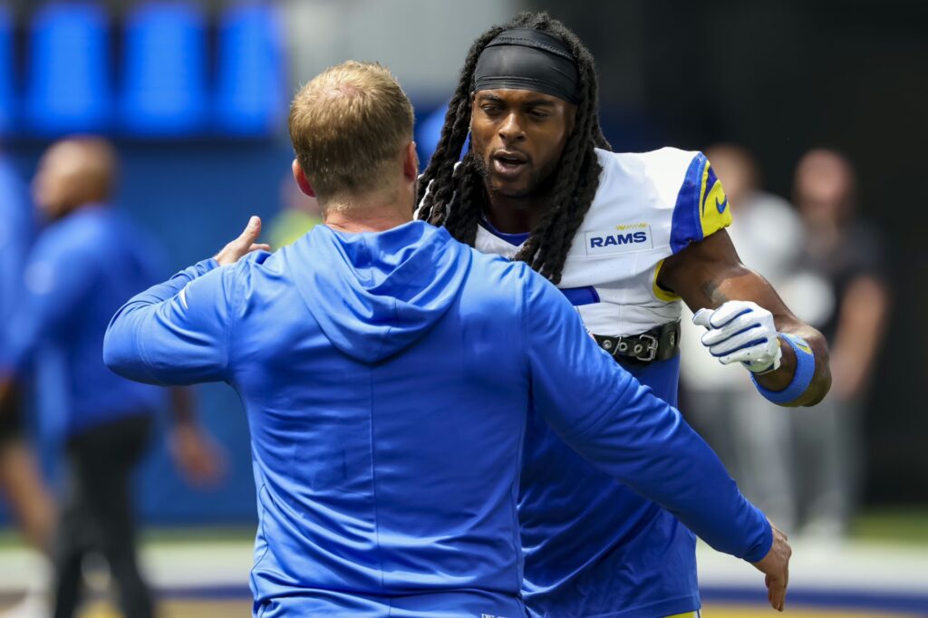 Los Angeles Rams wide receiver Davante Adams (17) hugs coach Sean McVay before the game against the Houston Texans at SoFi Stadium.