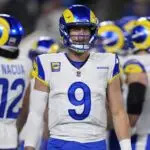 Los Angeles Rams quarterback Matthew Stafford (9) reacts in the first half during the NFC Wild Card Round game at Bank of America Stadium on Jan 10, 2026.