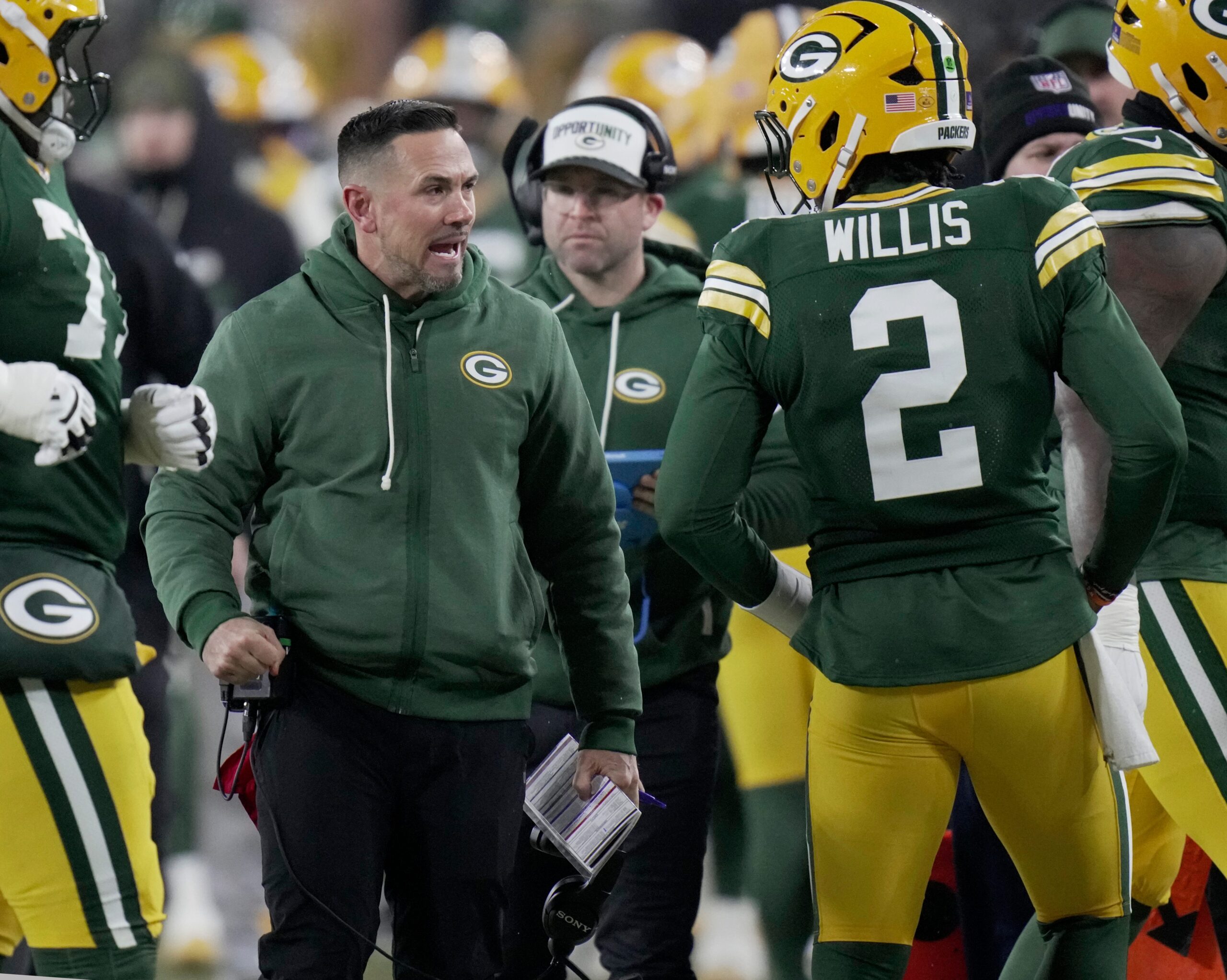 Green Bay Packers head coach Matt Lafleur yells at quarterback Malik Willis after a fumble during the second quarter of their game against the Baltimore Ravens Saturday, December 27, 2025 at Lambeau Field in Green Bay, Wisconsin.
