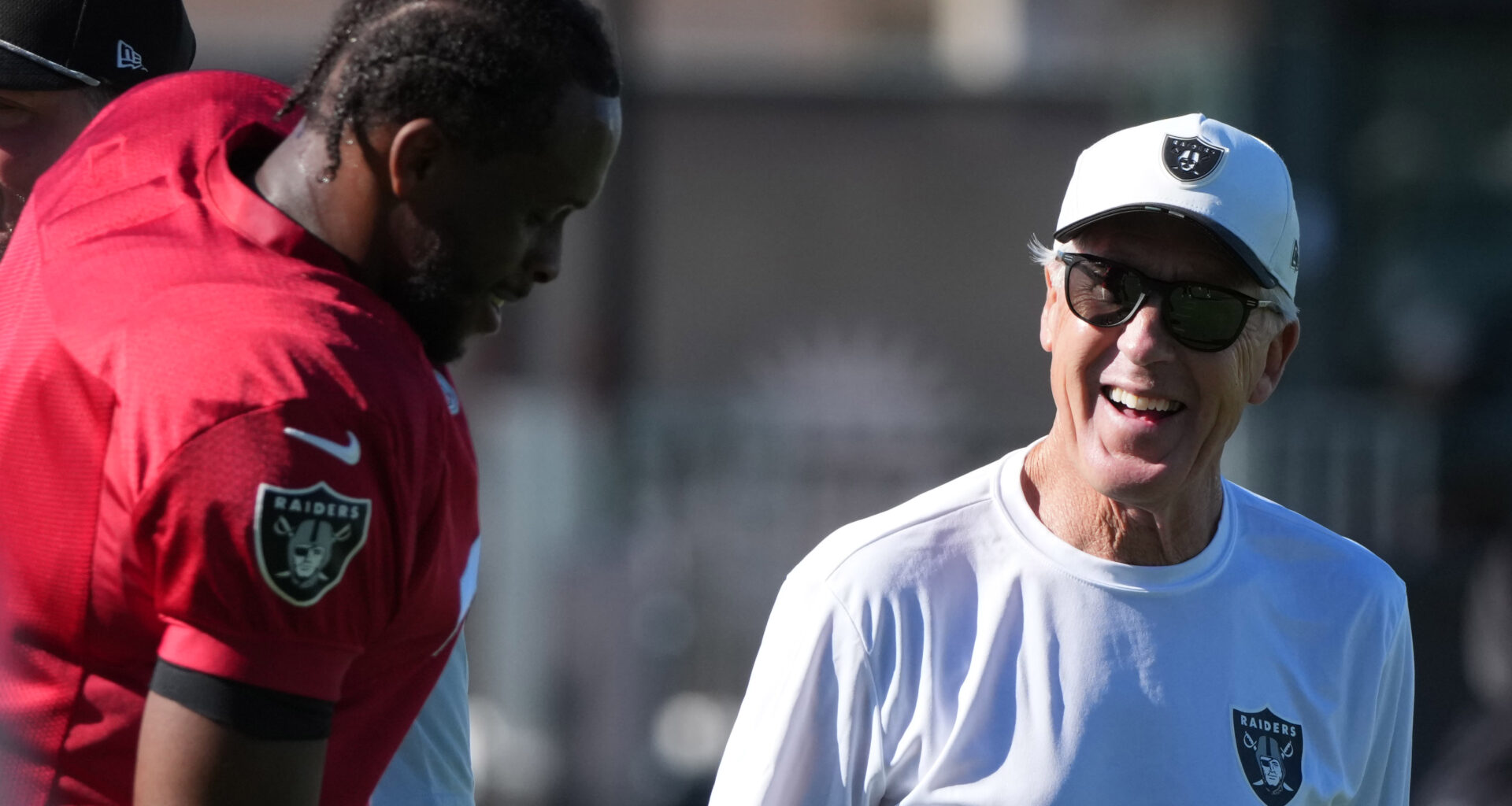 Former Las Vegas Raiders quarterback Geno Smith with former coach Pete Carroll