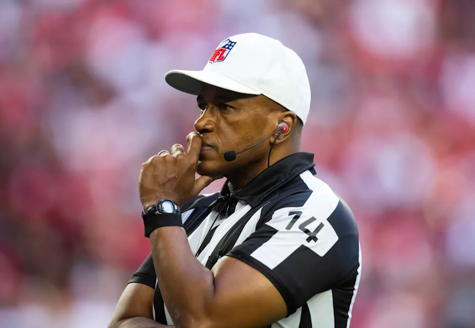 Jan 5, 2025; Glendale, Arizona, USA; NFL referee Shawn Smith during the Arizona Cardinals game against the San Francisco 49ers at State Farm Stadium. Mandatory Credit: Mark J. Rebilas-Imagn Images© Mark J. Rebilas-Imagn Images.
