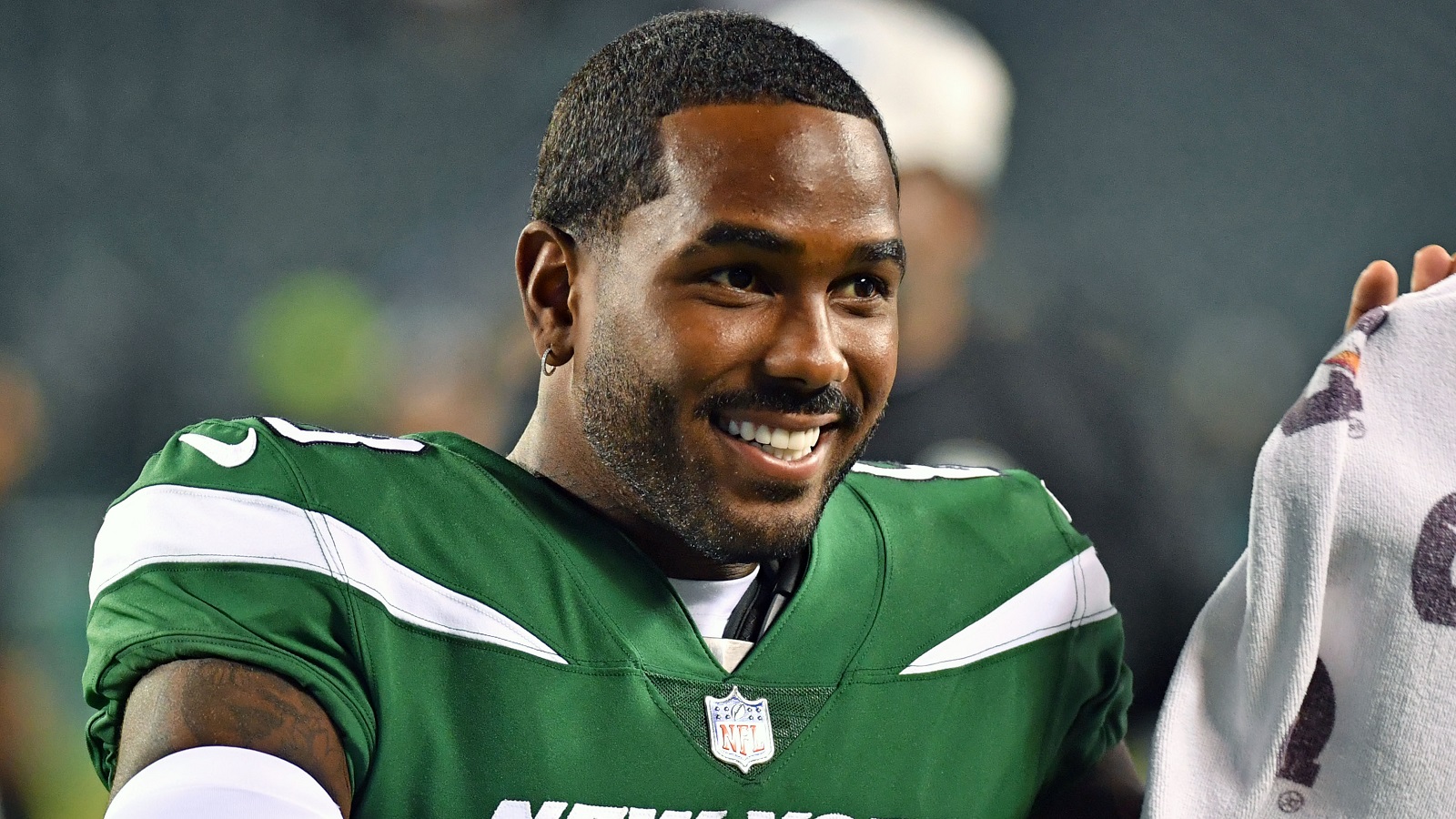 Elijah Moore holding a towel