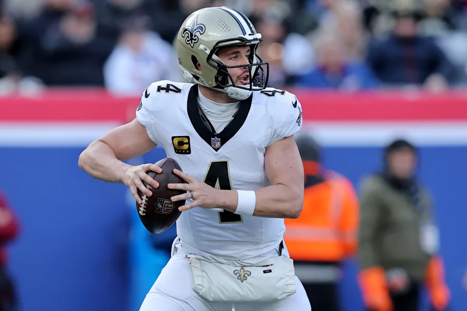 <p>Dec 8, 2024; East Rutherford, New Jersey, USA; New Orleans Saints quarterback Derek Carr (4) drops back to pass against the New York Giants during the first quarter at MetLife Stadium. Mandatory Credit: Brad Penner-Imagn Images</p><br>