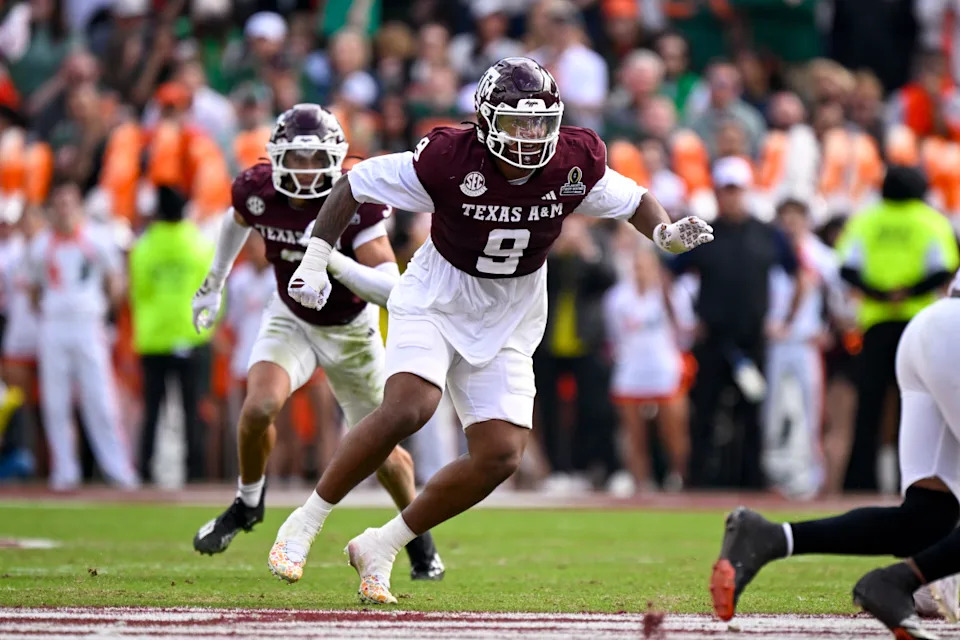 Dec 20, 2025; College Station, TX, USA; Texas A&M Aggies defensive end Cashius Howell (9) rushes the line during the game between the Aggies and the Hurricanes at Kyle Field. Jerome Miron-Imagn Images