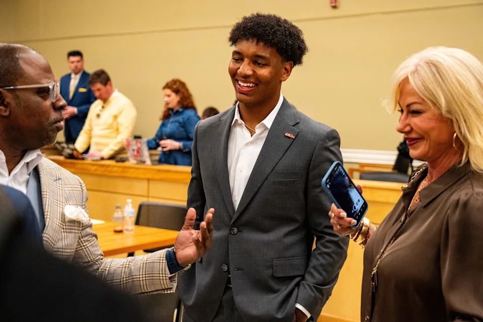 <p>Ole Miss quarterback Trinidad Chambliss talks with supporters after the hearing of Chambliss in his lawsuit against the NCAA at Calhoun County Courthouse in Pittsboro, Miss., on Thursday, Feb. 12, 2026. Chambliss was granted a preliminary injunction against the NCAA.</p>