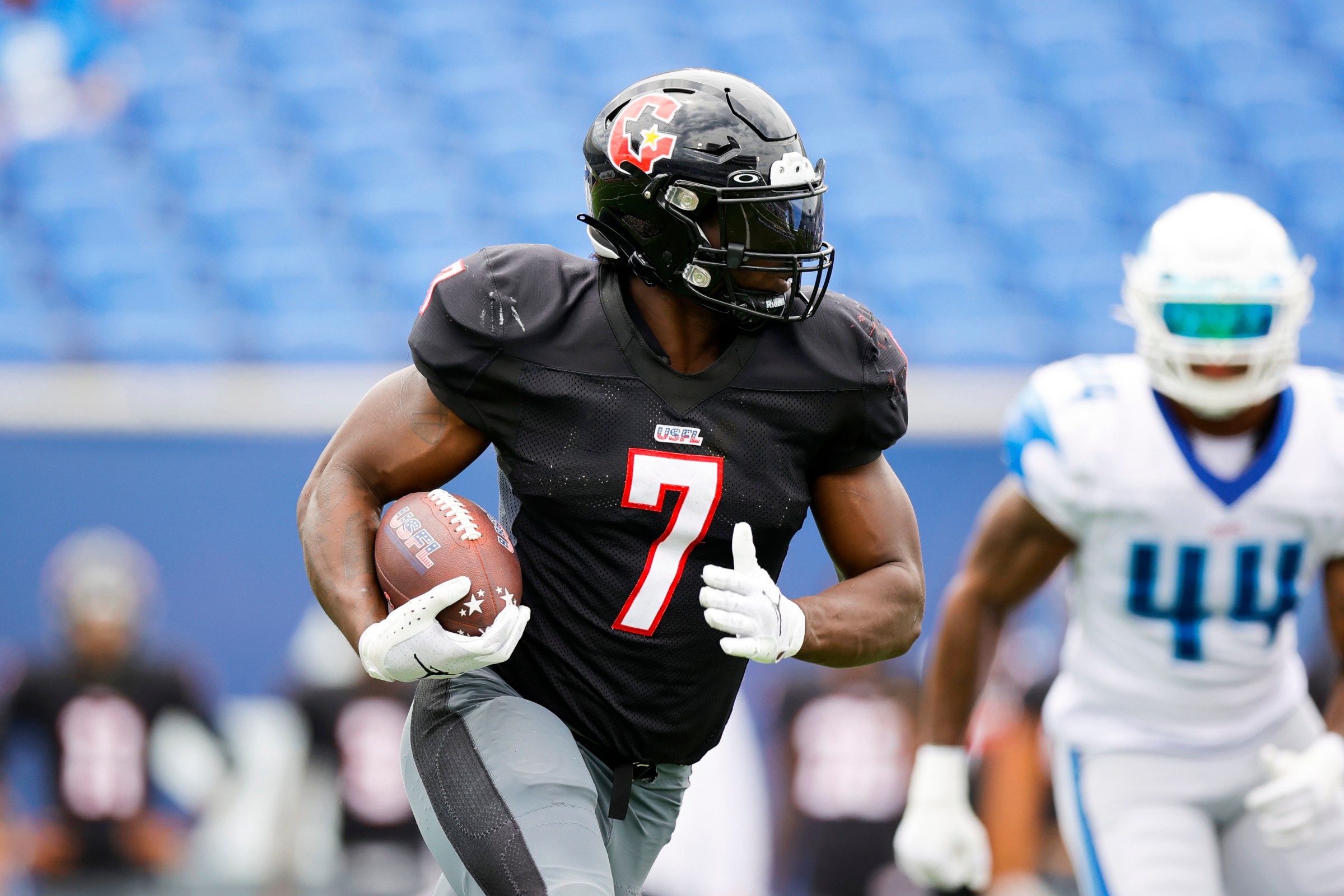 MEMPHIS, TENNESSEE - JUNE 18: Mark Thompson #7 of the Houston Gamblers carries the ball against the New Orleans Breakers during the first quarter at Simmons Bank Liberty Stadium on June 18, 2023 in Memphis, Tennessee. (Photo by Alex Slitz/USFL/Getty Images for USFL)