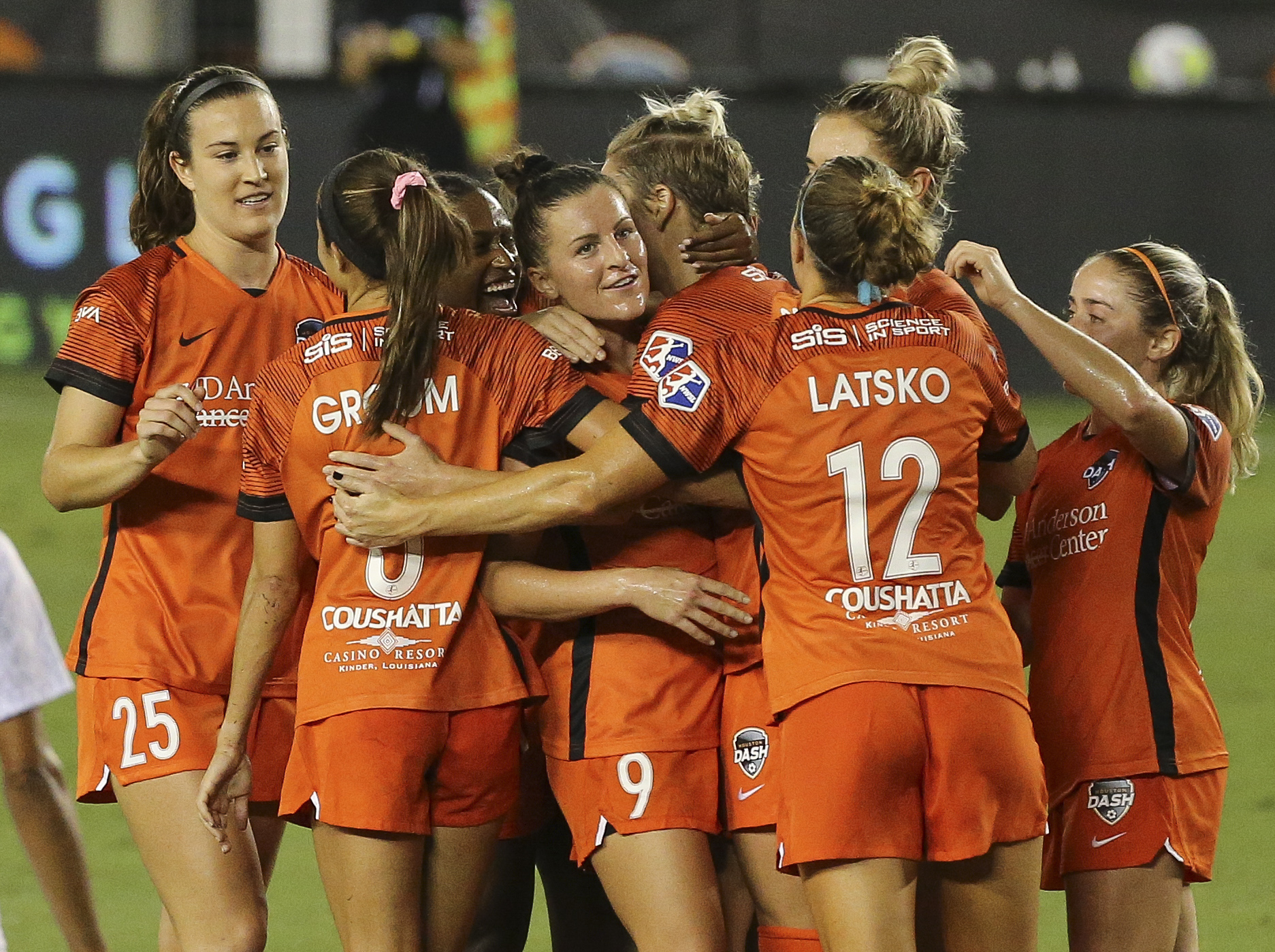 Houston Dash players gather to celebrate midfielder Sophie Schmidt’s goal during the second half of a NWSL game against the Orlando Pride Saturday, Sept. 26, 2020, at BBVA Stadium in Houston. The Dash defeated the Pride 3-1. (Photo by Yi-Chin Lee/Houston Chronicle via Getty Images)