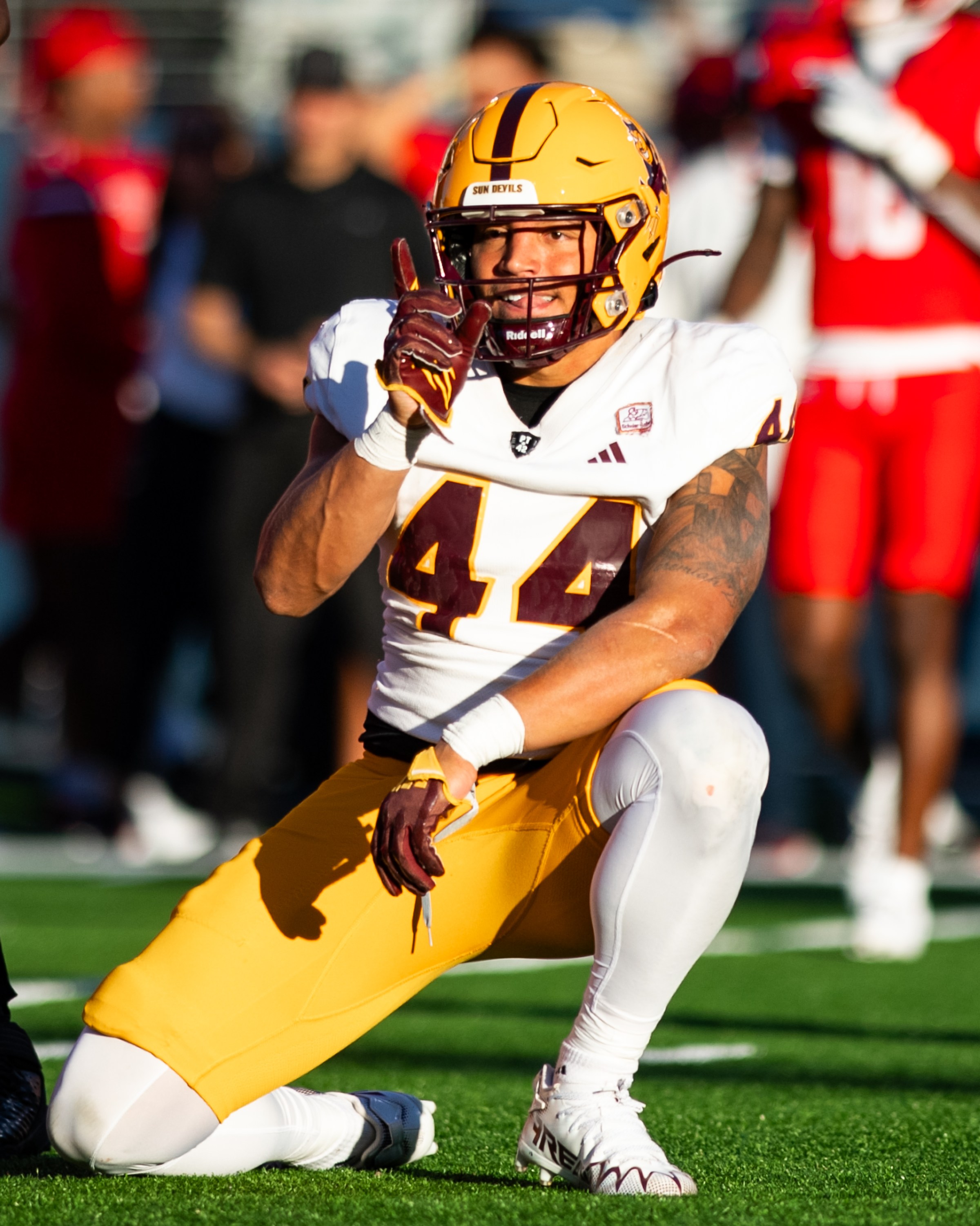 TUCSON, ARIZONA - NOVEMBER 30: Linebacker Keyshaun Elliott #44 of the Arizona State Sun Devils celebrates a defensive stop against the Arizona Wildcats during the second half of the NCAAF game at Arizona Stadium on November 30, 2024 in Tucson, Arizona. The Suns Devils defeated the Wildcats 49-7. (Photo by Kelsey Grant/Getty Images)