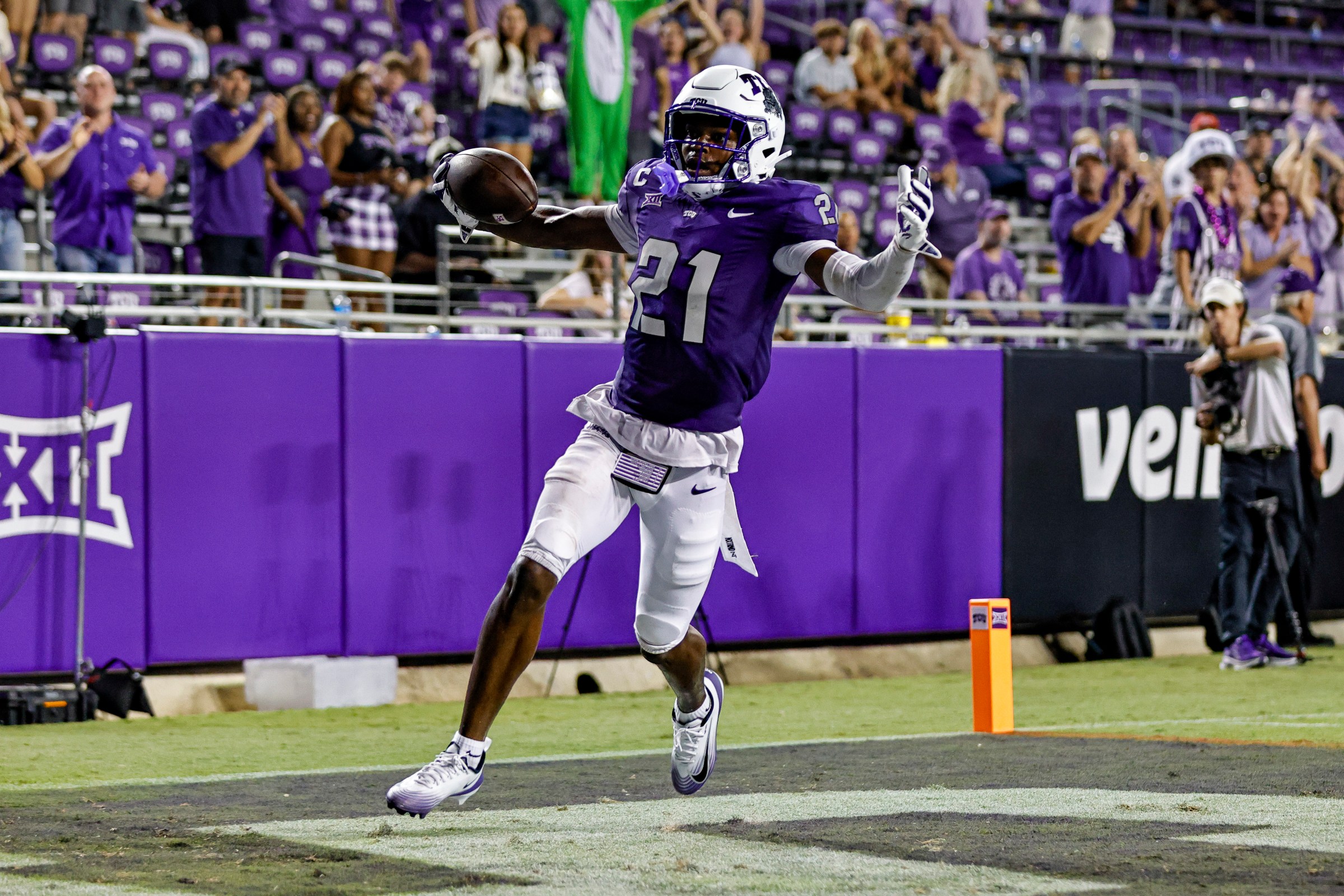 FORT WORTH, TX - SEPTEMBER 13: TCU Horned Frogs safety Bud Clark (21) returns a fumble that gets called back during the game between the TCU Horned Frogs and the Abilene Christian Wildcats on September 13, 2025 at Amon G. Carter Stadium in Fort Worth, Texas. (Photo by Matthew Pearce/Icon Sportswire via Getty Images)