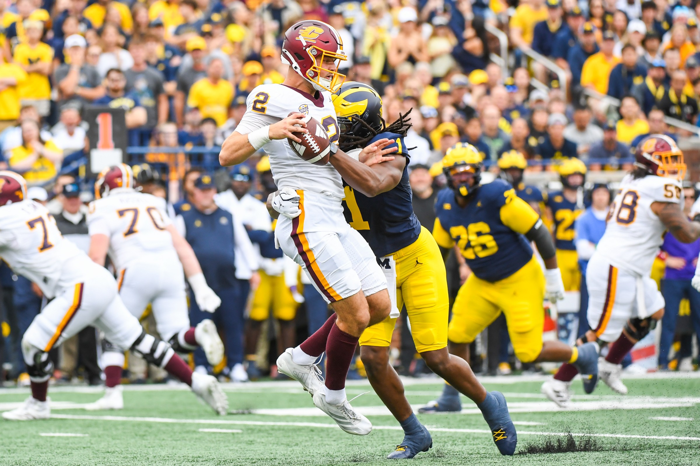 ANN ARBOR, MICHIGAN - SEPTEMBER 13: Jaishawn Barham #1 of the Michigan Wolverines sacks Joe Labas #2 of the Central Michigan Chippewas during the first half of a college football game at Michigan Stadium on September 13, 2025 in Ann Arbor, Michigan. The Michigan Wolverines won the game 63-3. (Photo by Aaron J. Thornton/Getty Images)