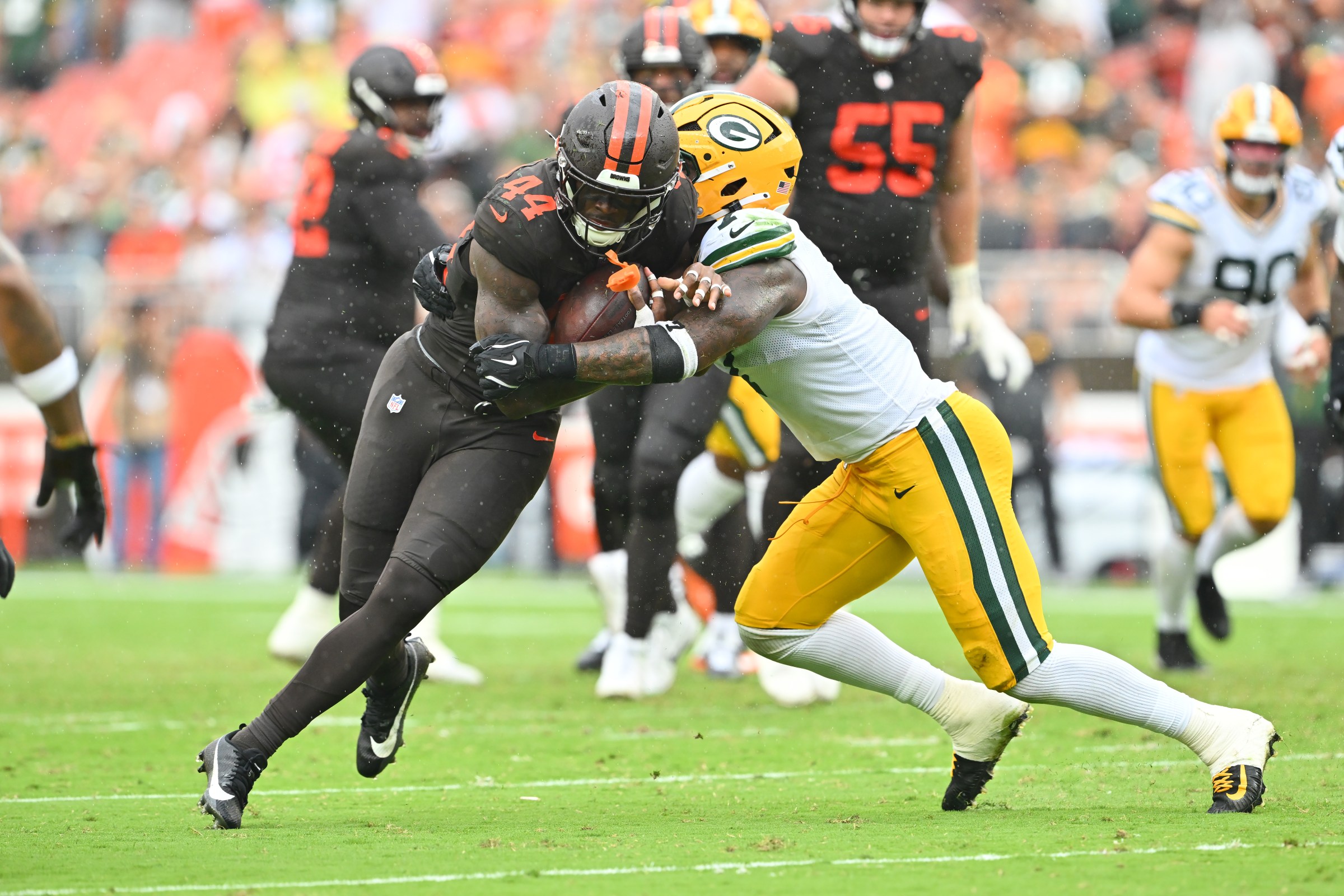 CLEVELAND, OHIO - SEPTEMBER 21: Tight end Harold Fannin Jr. #44 of the Cleveland Browns is tackled by linebacker Quay Walker #7 of the Green Bay Packers during the fourth quarter at Huntington Bank Field on September 21, 2025 in Cleveland, Ohio. The Browns defeated the Packers 13-10. (Photo by Jason Miller/Getty Images)