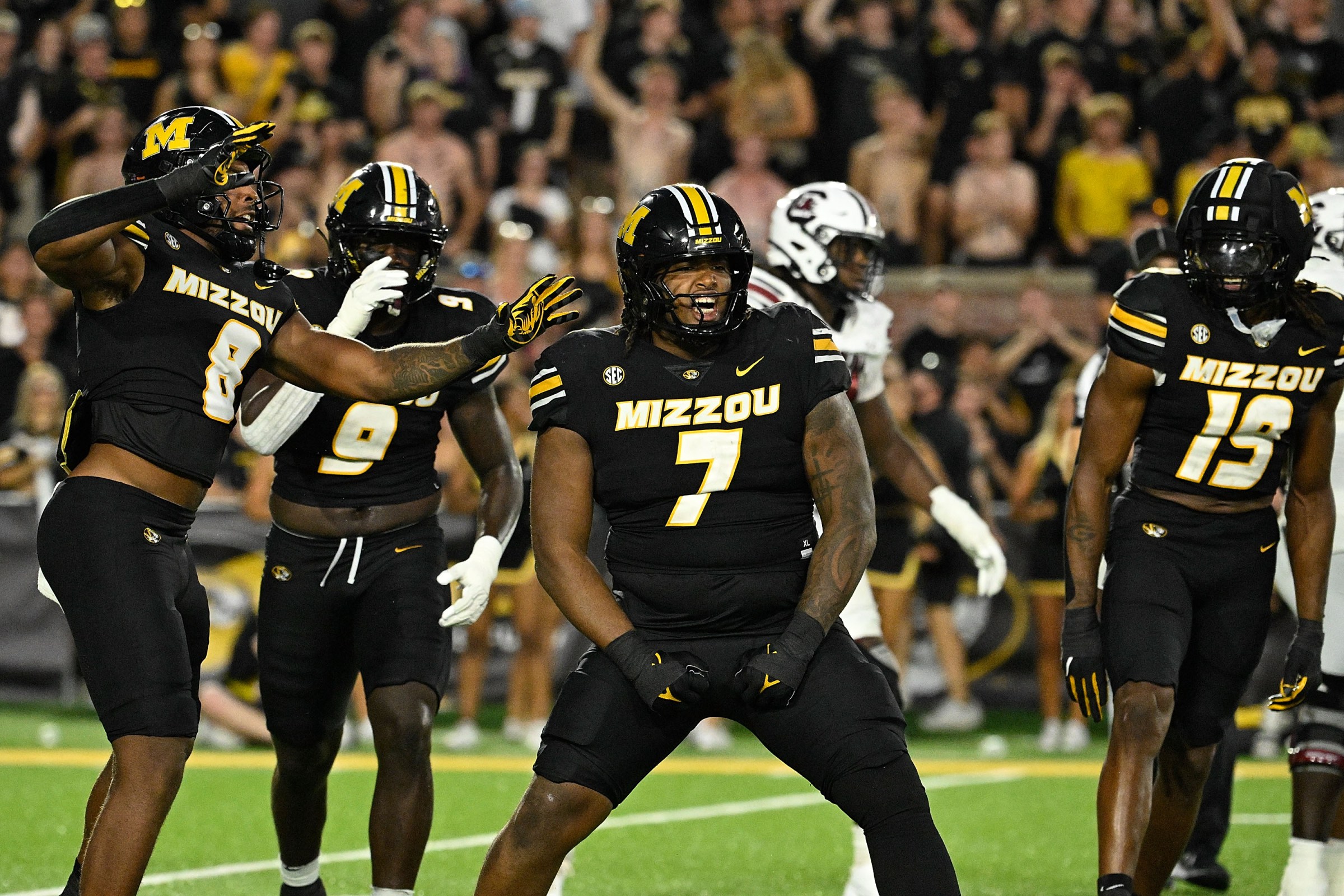 COLUMBIA, MISSOURI - SEPTEMBER 20: Chris McClellan #7 of the Missouri Tigers reacts with teammates after a sack against LaNorris Sellers #16 of the South Carolina Gamecocks at Faurot Field at Memorial Stadium on September 20, 2025 in Columbia, Missouri. (Photo by Jeff Le/Getty Images)