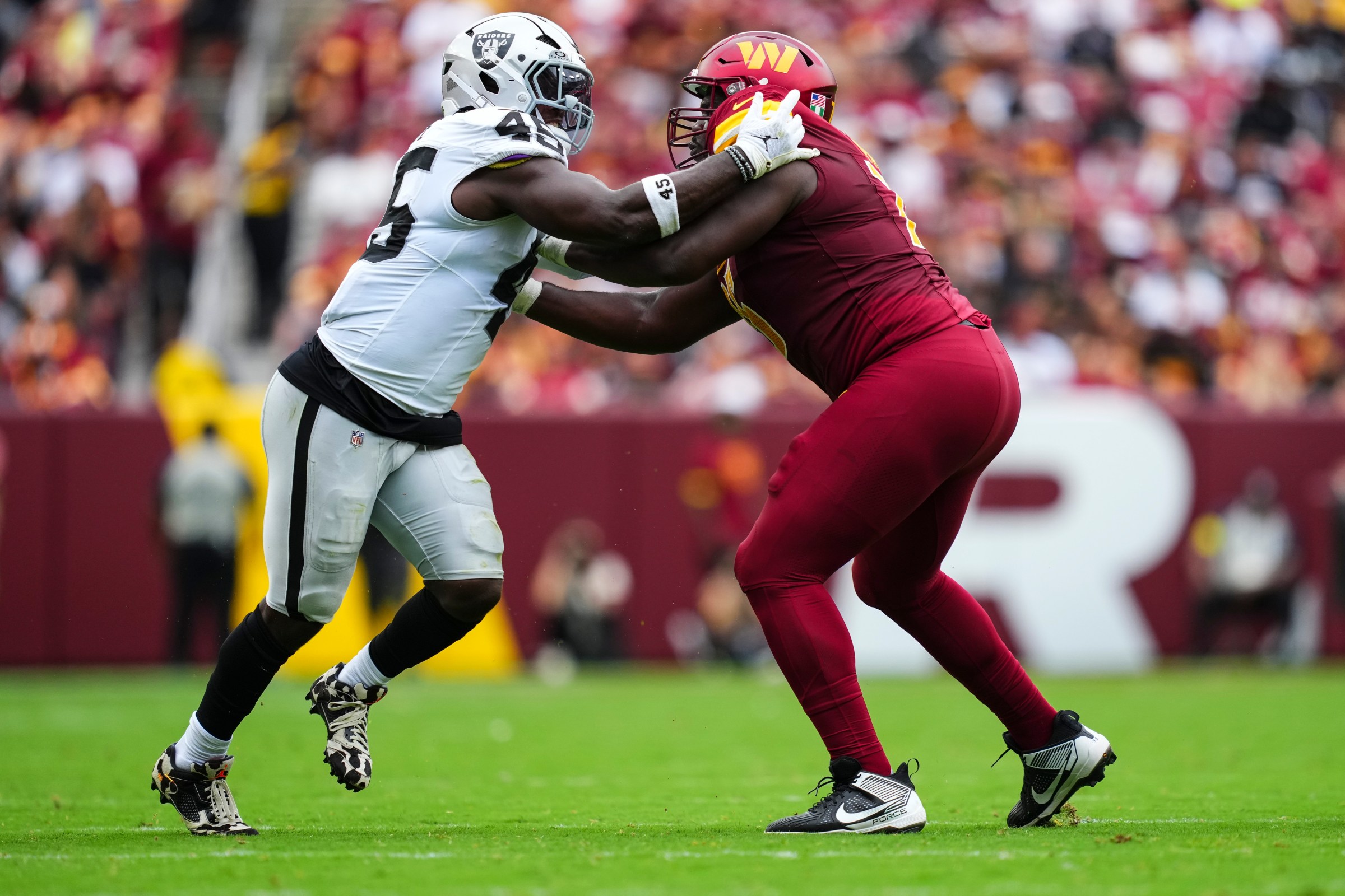LANDOVER, MD - SEPTEMBER 21: Malcolm Koonce #51 of the Las Vegas Raiders rushes the passer during an NFL football game against the Washington Commanders at Northwest Stadium on September 21, 2025 in Landover, Maryland. (Photo by Cooper Neill/Getty Images)