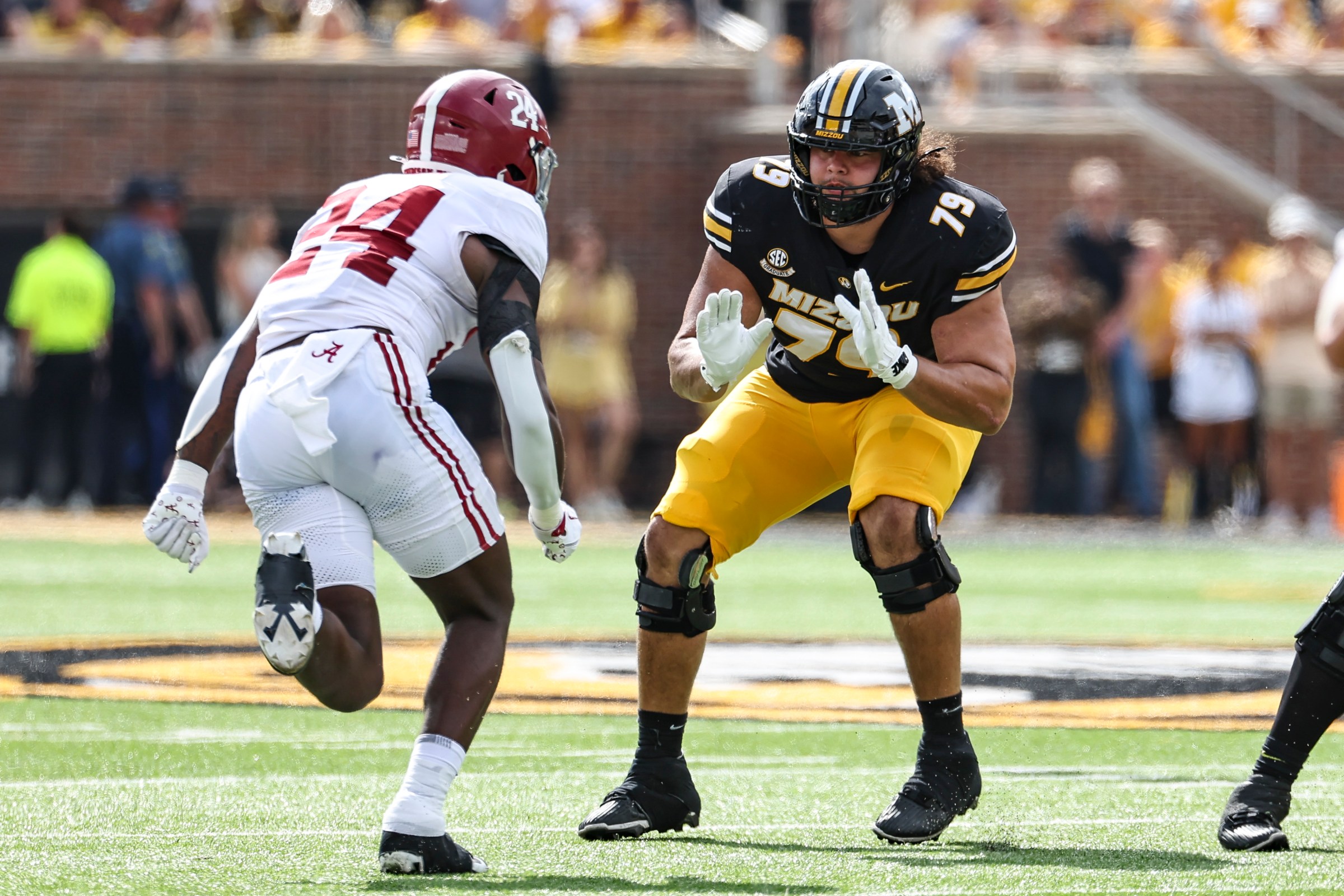 COLUMBIA, MO - OCTOBER 11: Missouri Tigers offensive lineman Keagen Trost (79) blocks Alabama Crimson Tide linebacker Noah Carter (24) in the fourth quarter of an SEC football game between the Alabama Crimson Tide and Missouri Tigers on October 11, 2025 at Memorial Stadium in Columbia, MO. (Photo by Scott Winters/Icon Sportswire via Getty Images)