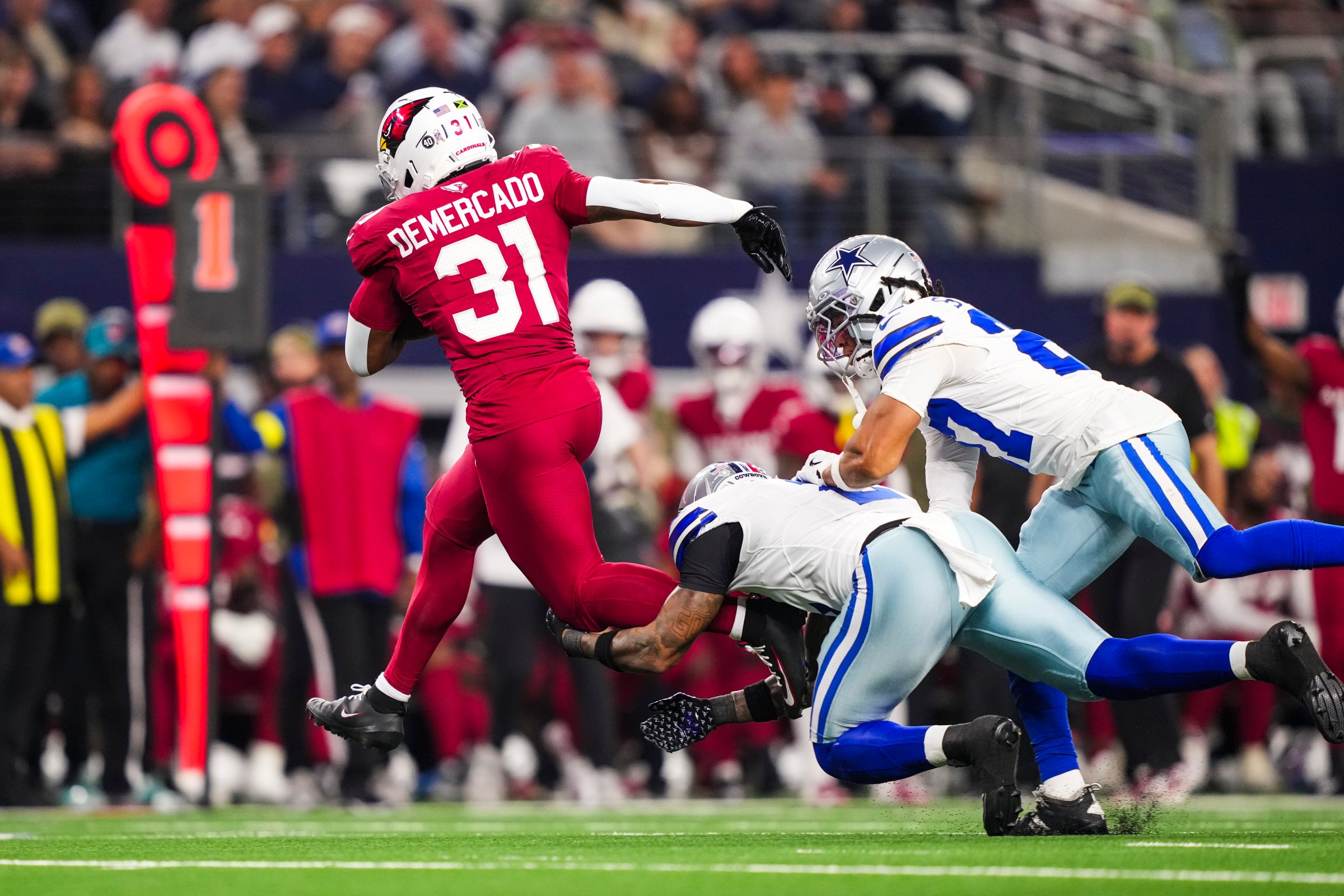 ARLINGTON, TEXAS - NOVEMBER 03: Emari Demercado #31 of the Arizona Cardinals runs the ball during an NFL football game against the Dallas Cowboys at AT&T Stadium on November 3, 2025 in Arlington, Texas. (Photo by Perry Knotts/Getty Images)