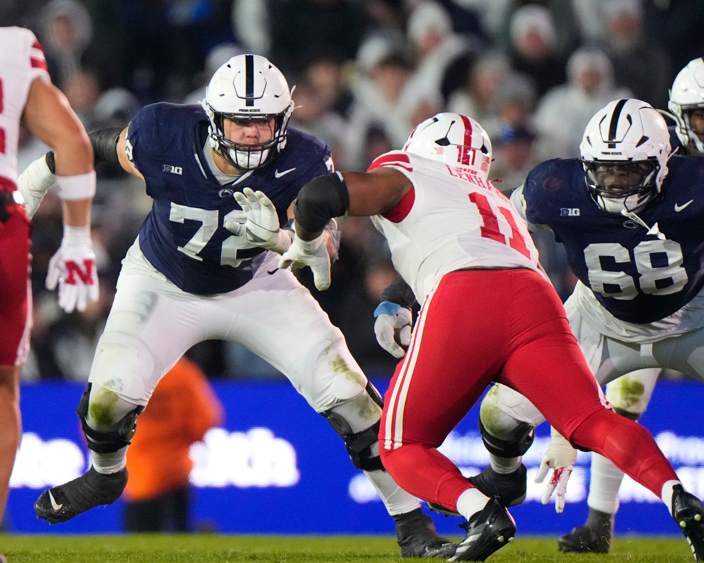 UNIVERSITY PARK, PA - NOVEMBER 22: Penn State Nittany Lions Offensive Lineman Nolan Rucci (72) blocks Nebraska Cornhuskers Defensive Lineman Cameron Lenhardt (11) during the second half of the College Football between the Nebraska Cornhuskers and the Penn State Nittany Lions on November 22, 2025, at Beaver Stadium in University Park, PA. (Photo by Gregory Fisher/Icon Sportswire via Getty Images)