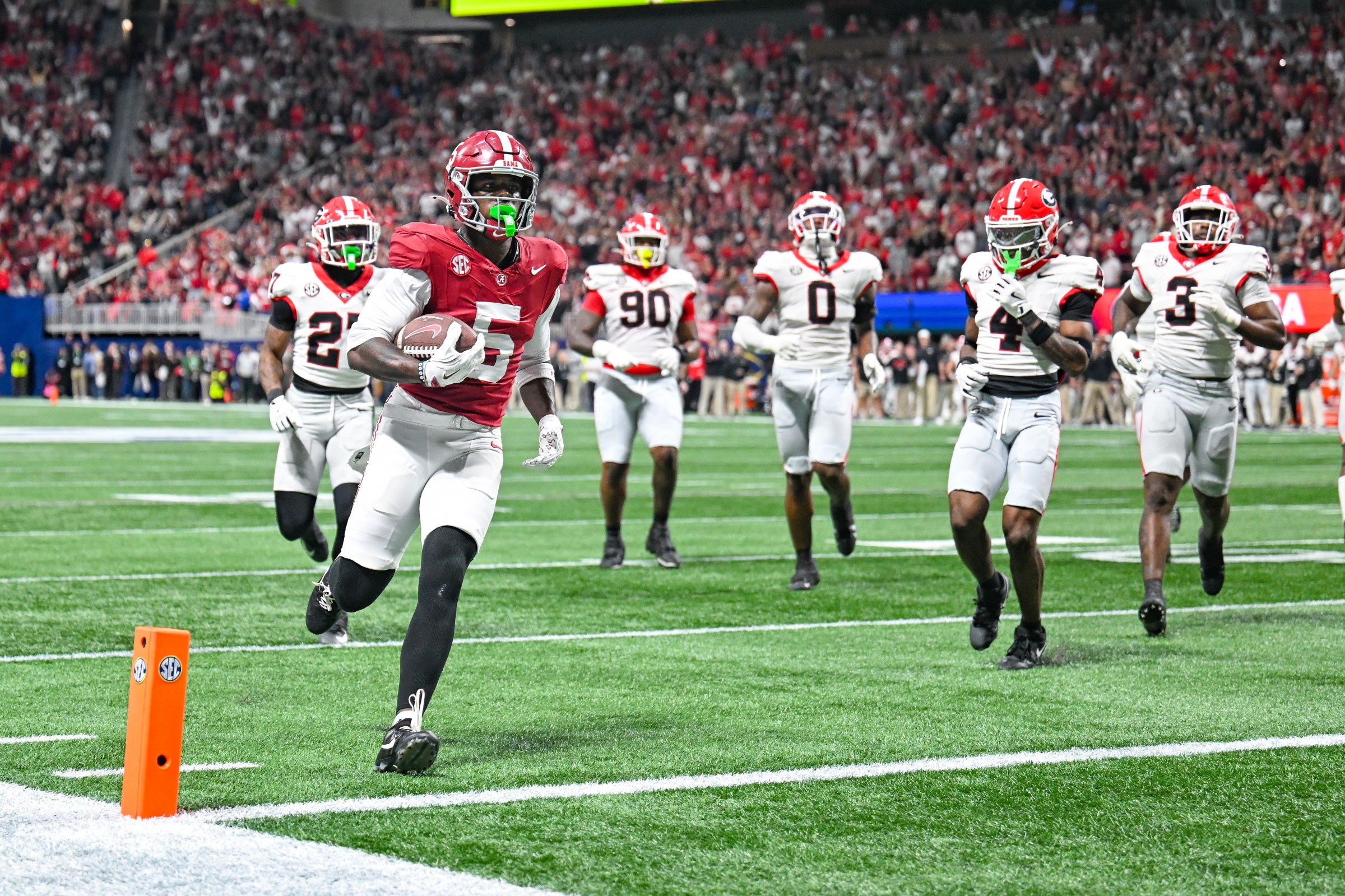 ATLANTA, GA - DECEMBER 06: Alabama wide receiver Germie Bernard (5) scores a second-half touchdown during the SEC Championship college football game between the Alabama Crimson Tide and the Georgia Bulldogs on December 6th, 2025 at Mercedes-Benz Stadium in Atlanta, GA. (Photo by Rich von Biberstein/Icon Sportswire via Getty Images)