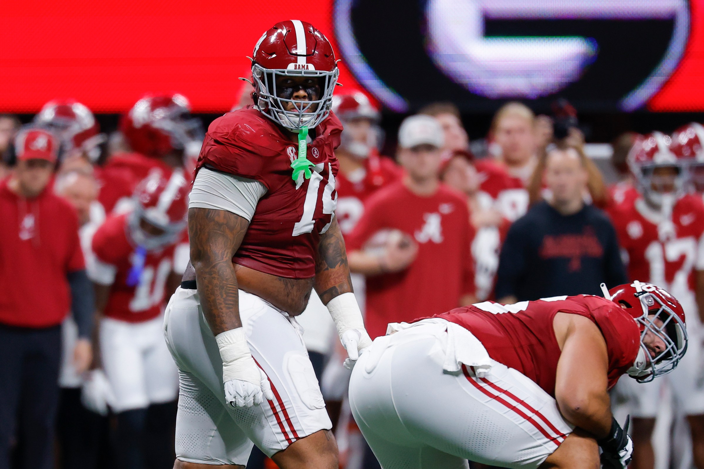 ATLANTA, GEORGIA - DECEMBER 6: Kadyn Proctor #74 of the Alabama Crimson Tide looks back during the third quarter against the Georgia Bulldogs in the 2025 SEC Championship at Mercedes-Benz Stadium on December 6, 2025 in Atlanta, Georgia. (Photo by Todd Kirkland/Getty Images)