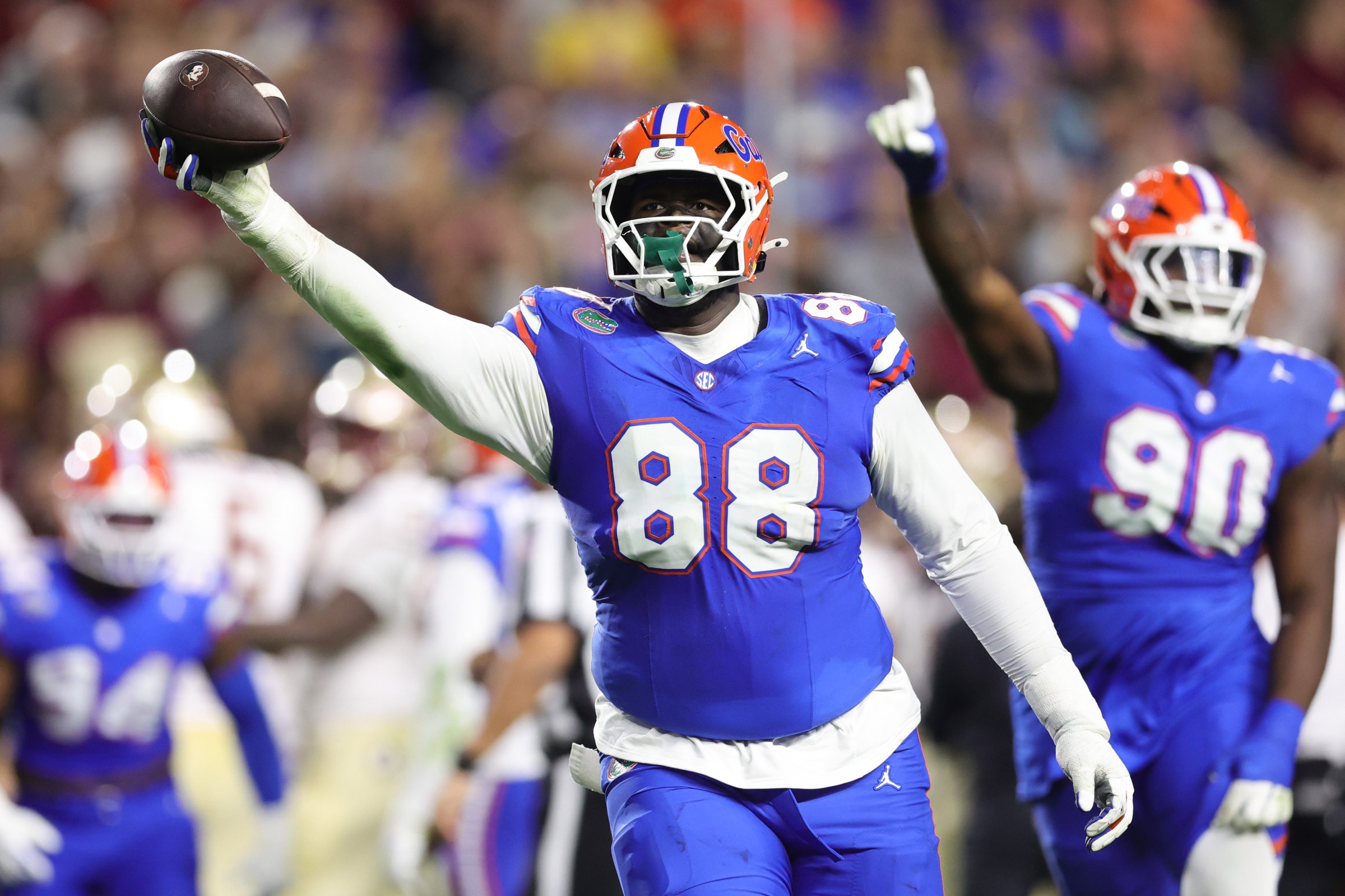 GAINESVILLE, FLORIDA - NOVEMBER 29: Caleb Banks #88 of the Florida Gators celebrates after recovering a fumble against the Florida State Seminoles during the second quarter of the game at Ben Hill Griffin Stadium on November 29, 2025 in Gainesville, Florida. (Photo by Megan Briggs/Getty Images)