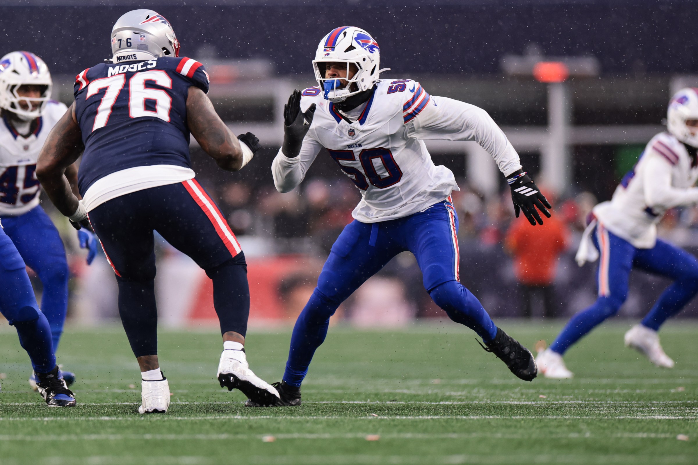 FOXBOROUGH, MASSACHUSETTS - DECEMBER 14: Greg Rousseau #50 of the Buffalo Bills runs downfield during the third quarter against the New England Patriots at Gillette Stadium on December 14, 2025 in Foxborough, Massachusetts. (Photo by Kathryn Riley/Getty Images)
