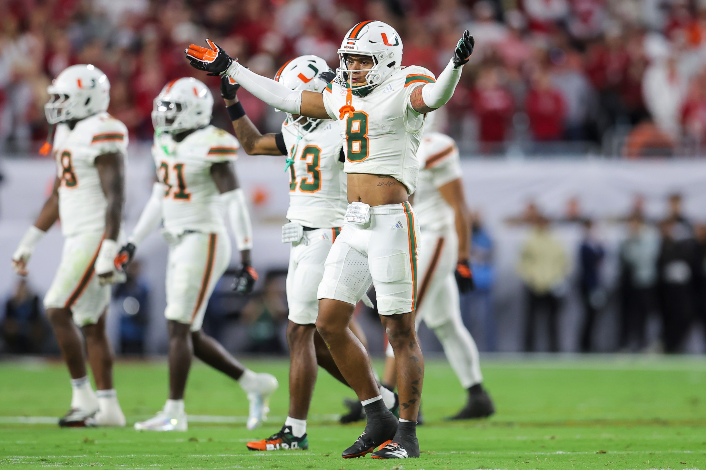 MIAMI GARDENS, FLORIDA - JANUARY 19: Jakobe Thomas #8 of the Miami Hurricanes reacts after a defensive play in the first half during the College Football Playoff National Championship between the Indiana Hoosiers and the Miami Hurricanes at Hard Rock Stadium on January 19, 2026 in Miami Gardens, Florida. (Photo by CFP/Getty Images)