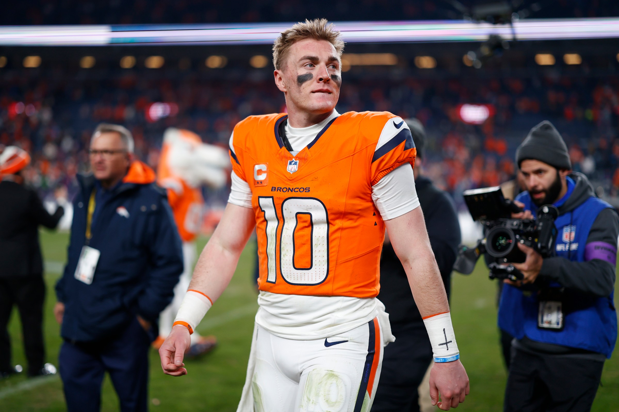DENVER, COLORADO - JANUARY 17: Bo Nix #10 of the Denver Broncos celebrates after defeating the Buffalo Bills with a score of 30 to 33 in overtime of the AFC Divisional Playoff game at Empower Field At Mile High on January 17, 2026 in Denver, Colorado. (Photo by Justin Edmonds/Getty Images)