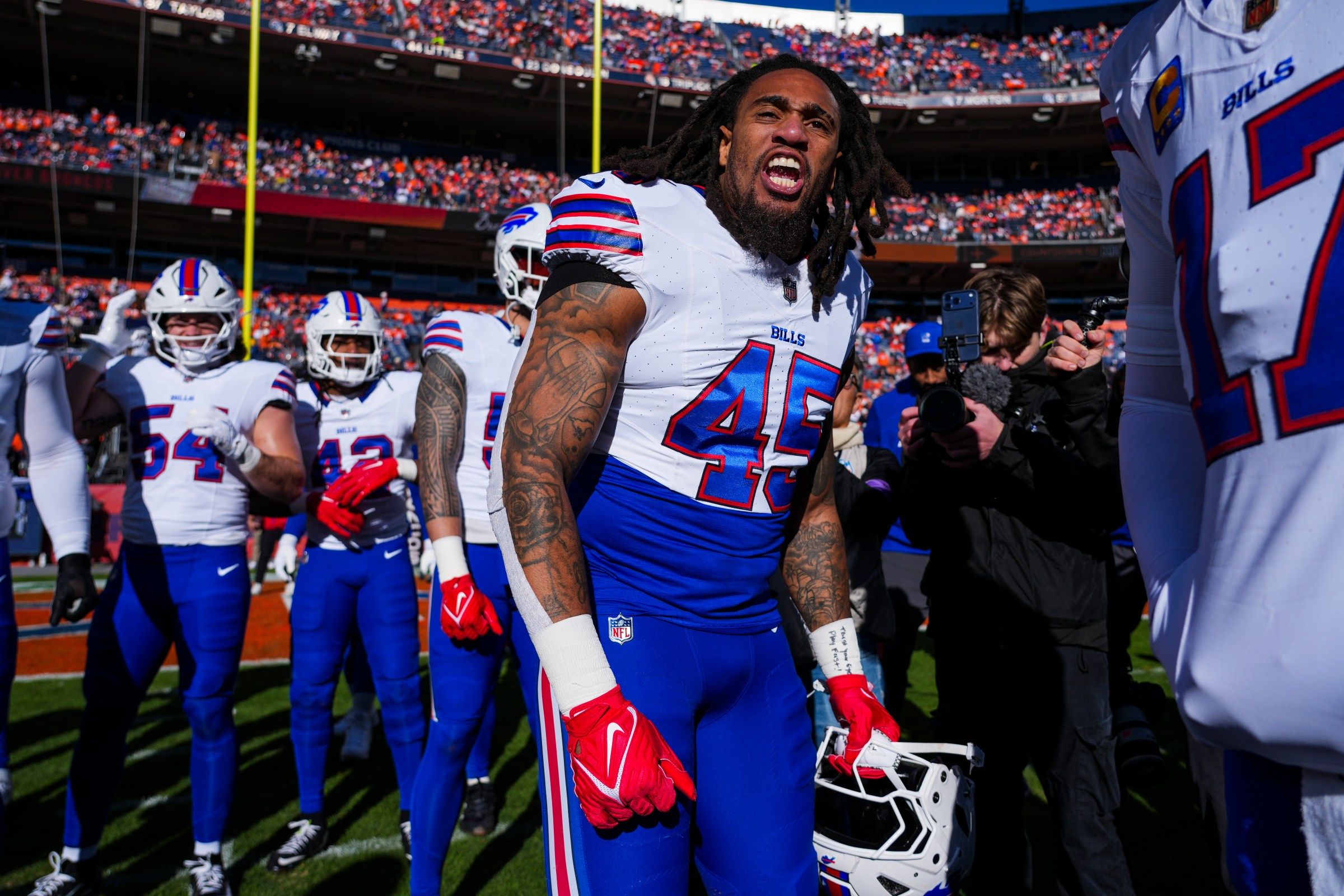 DENVER, COLORADO - JANUARY 17: Shaq Thompson #45 of the Buffalo Bills leads a huddle prior to an NFL divisional playoff football game against the Denver Broncos at Empower Field at Mile High on January 17, 2026 in Denver, Colorado. (Photo by Perry Knotts/Getty Images)