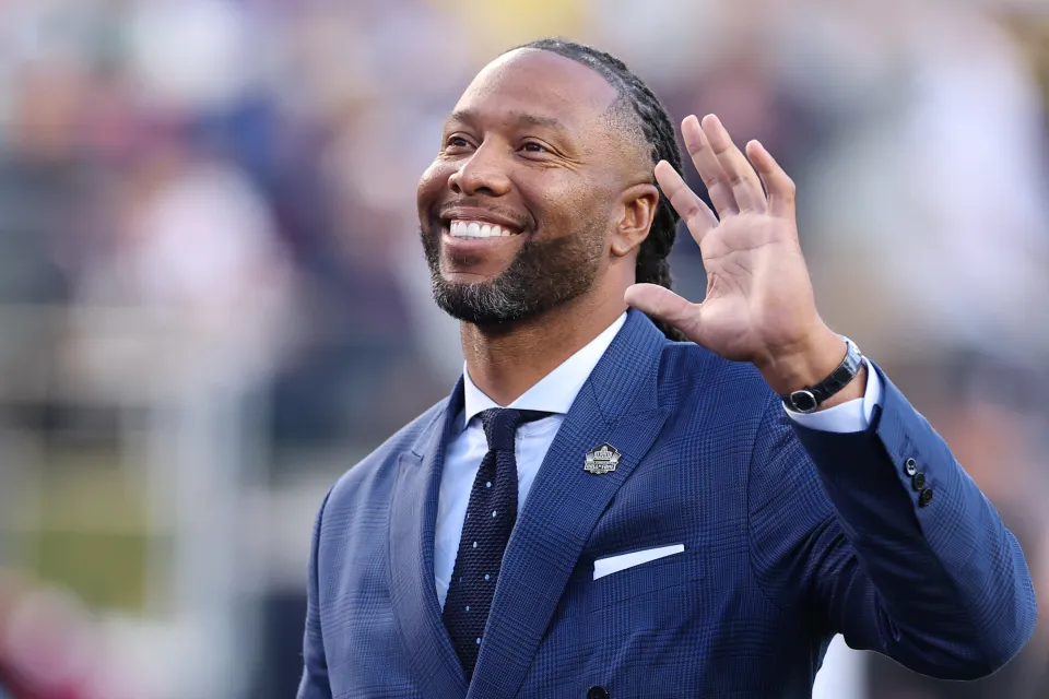 Hall of Fame inductee Larry Fitzgerald waves to the crowd during Super Bowl LX between the Seattle Seahawks and the New England Patriots at Levi's Stadium on February 08, 2026 in Santa Clara, California.